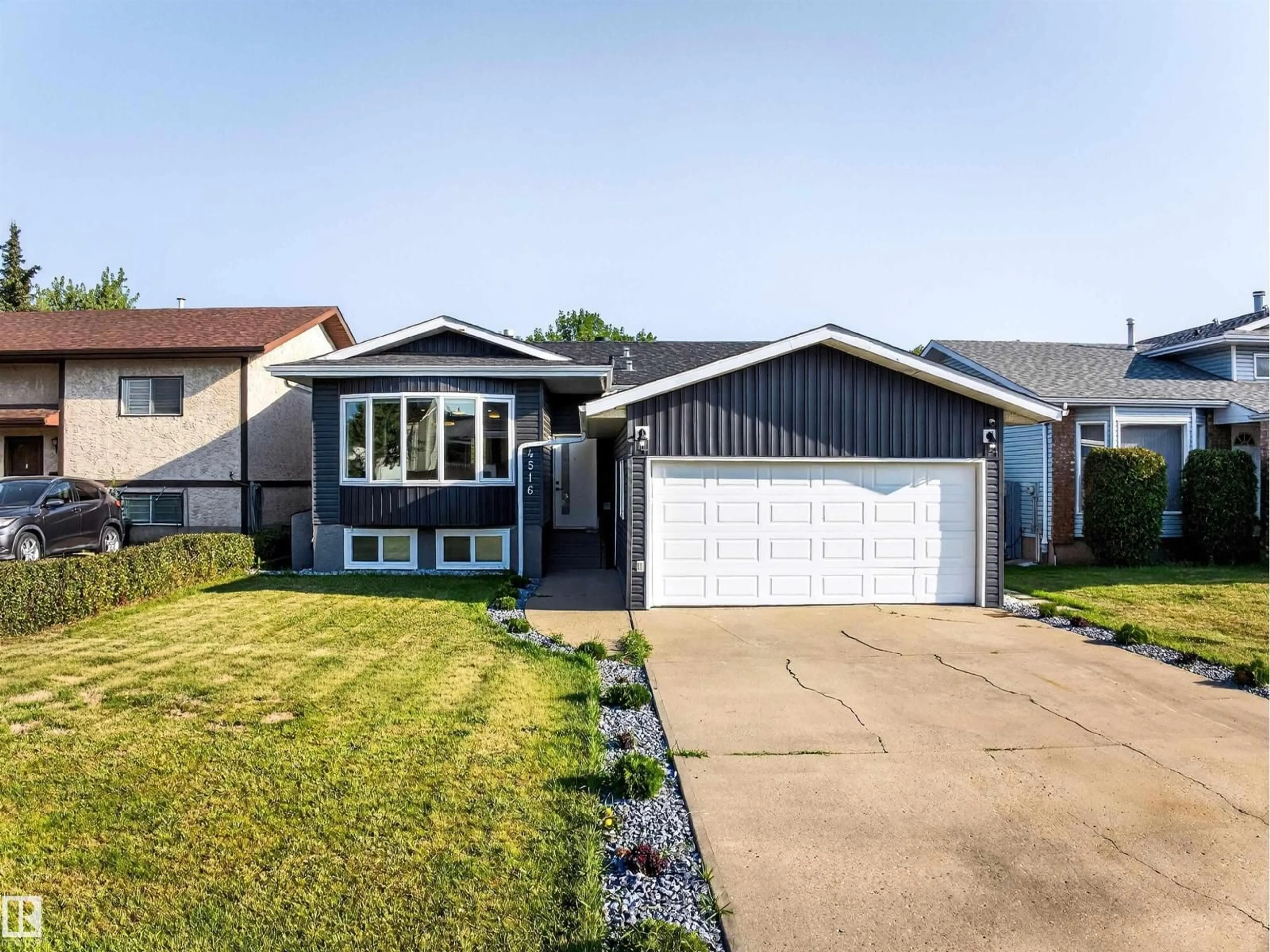 Home with vinyl exterior material, street for 4516 27 AV, Edmonton Alberta T6L4P9