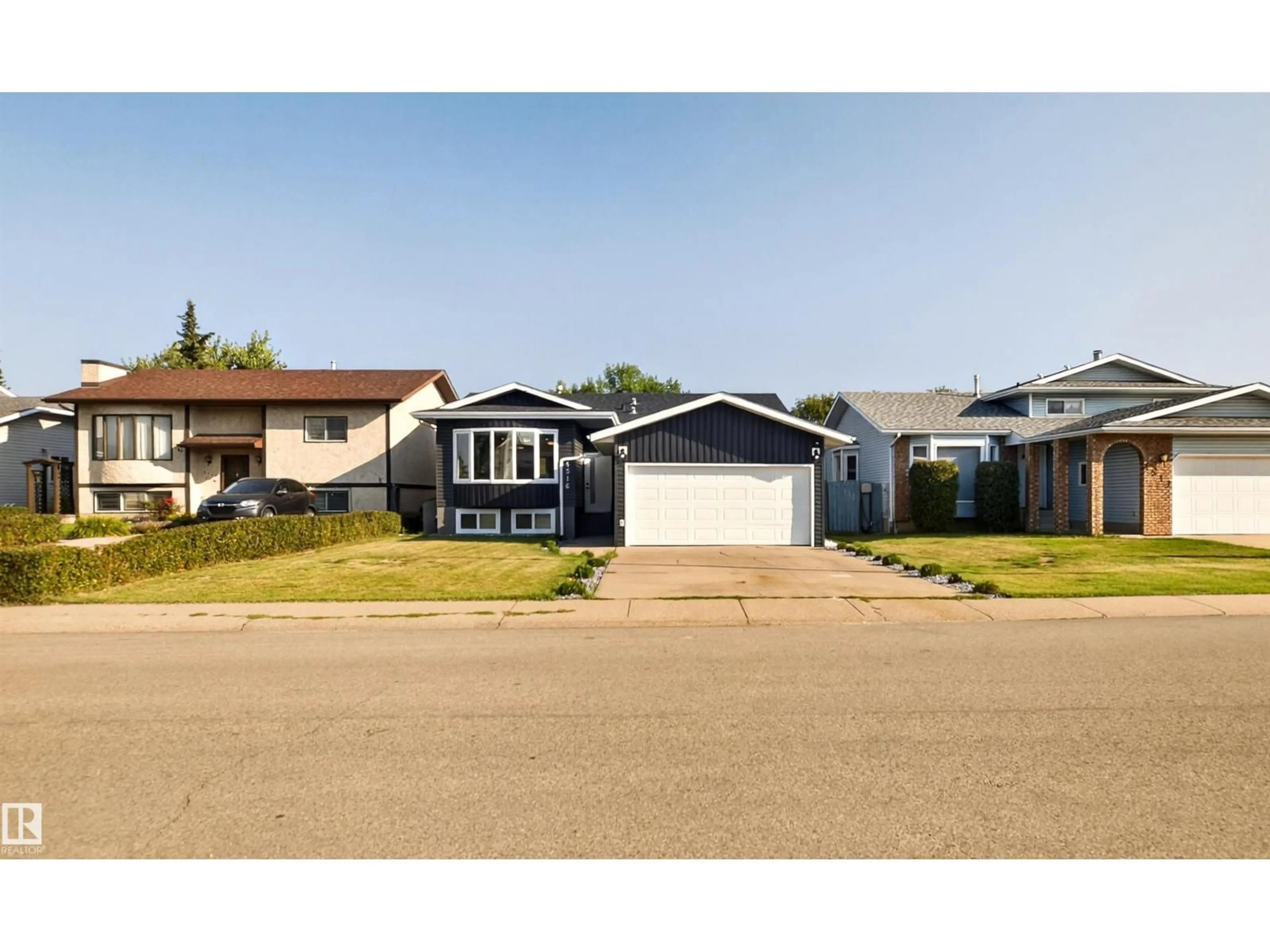 Home with vinyl exterior material, street for 4516 27 AV, Edmonton Alberta T6L4P9