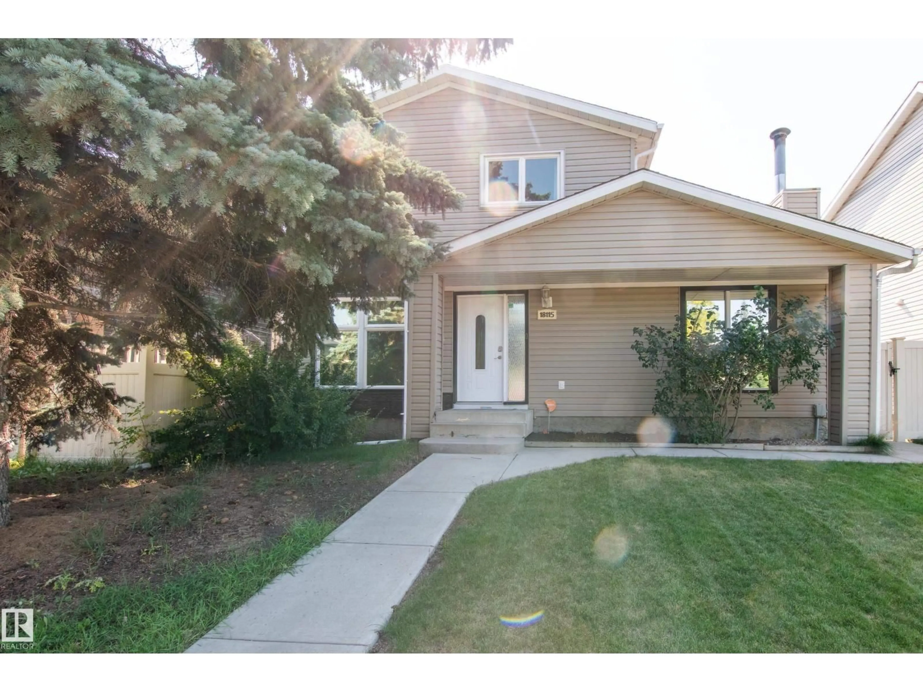 Home with vinyl exterior material, street for 18115 76 AV, Edmonton Alberta T5T2E9