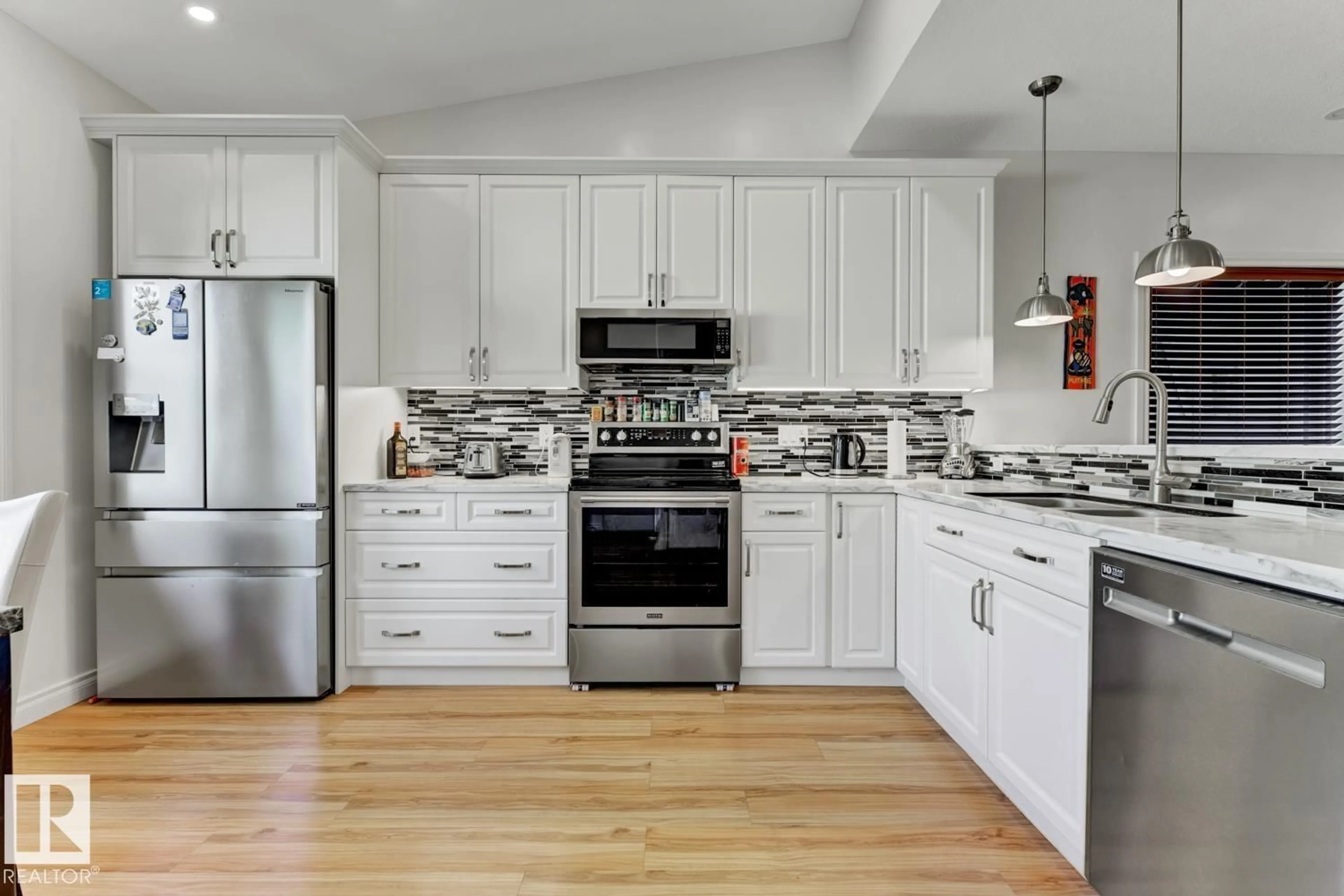 Open concept kitchen, unknown for 11306 89 ST, Edmonton Alberta T5B3T6