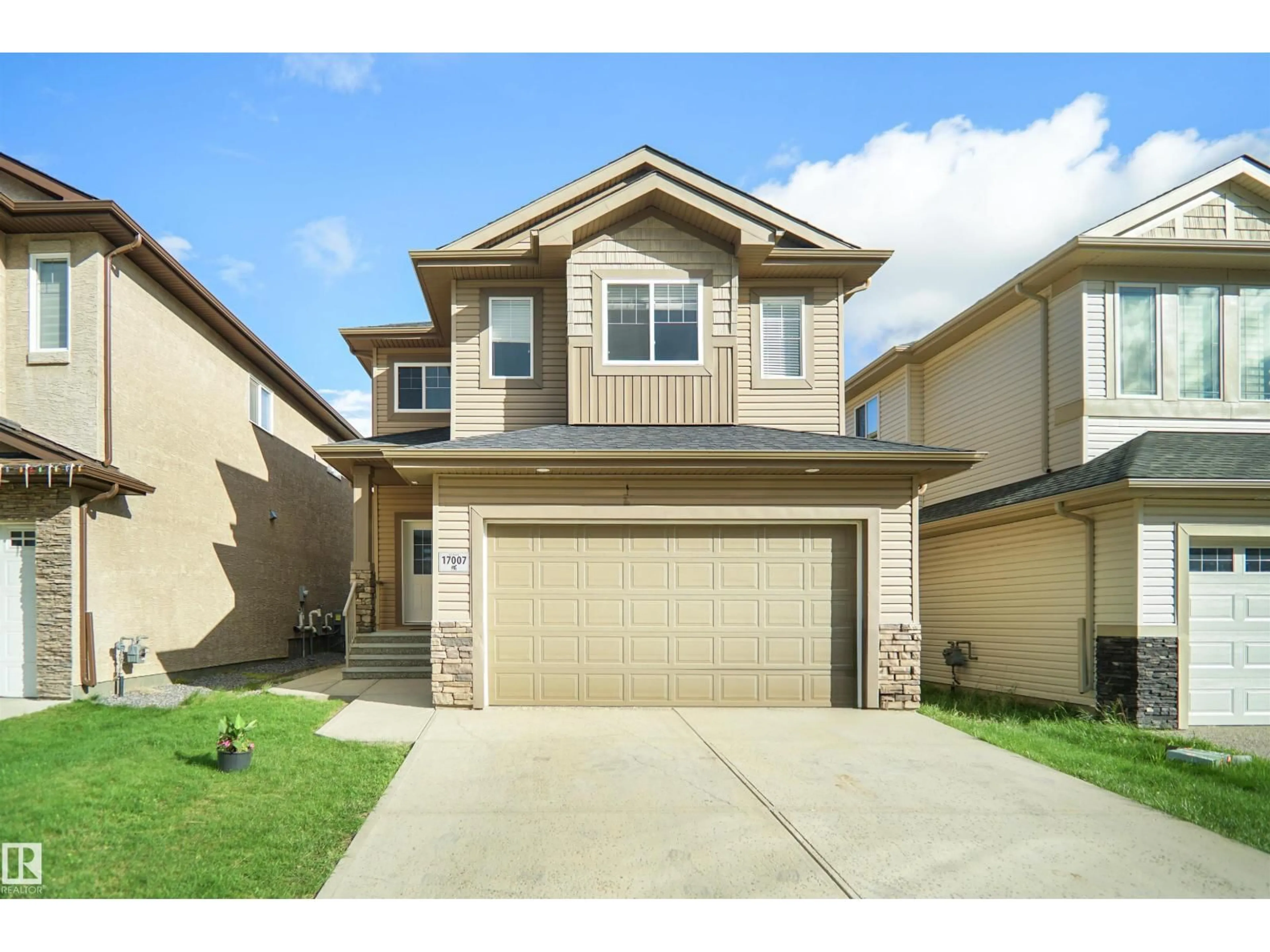 Home with vinyl exterior material, street for 17007 62 ST, Edmonton Alberta T5Y2V9