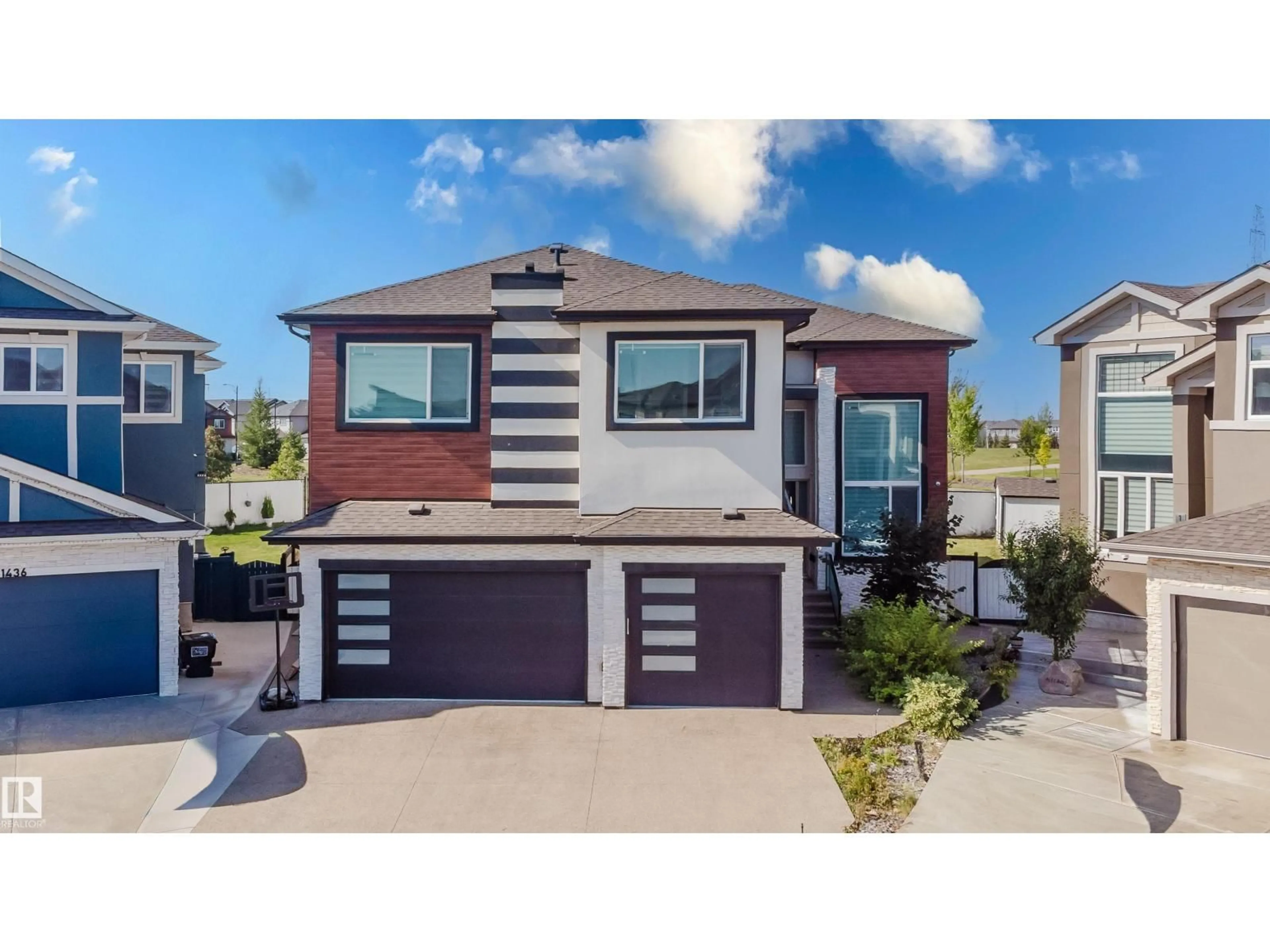 Home with vinyl exterior material, street for 1440 25 ST, Edmonton Alberta T6T2K7
