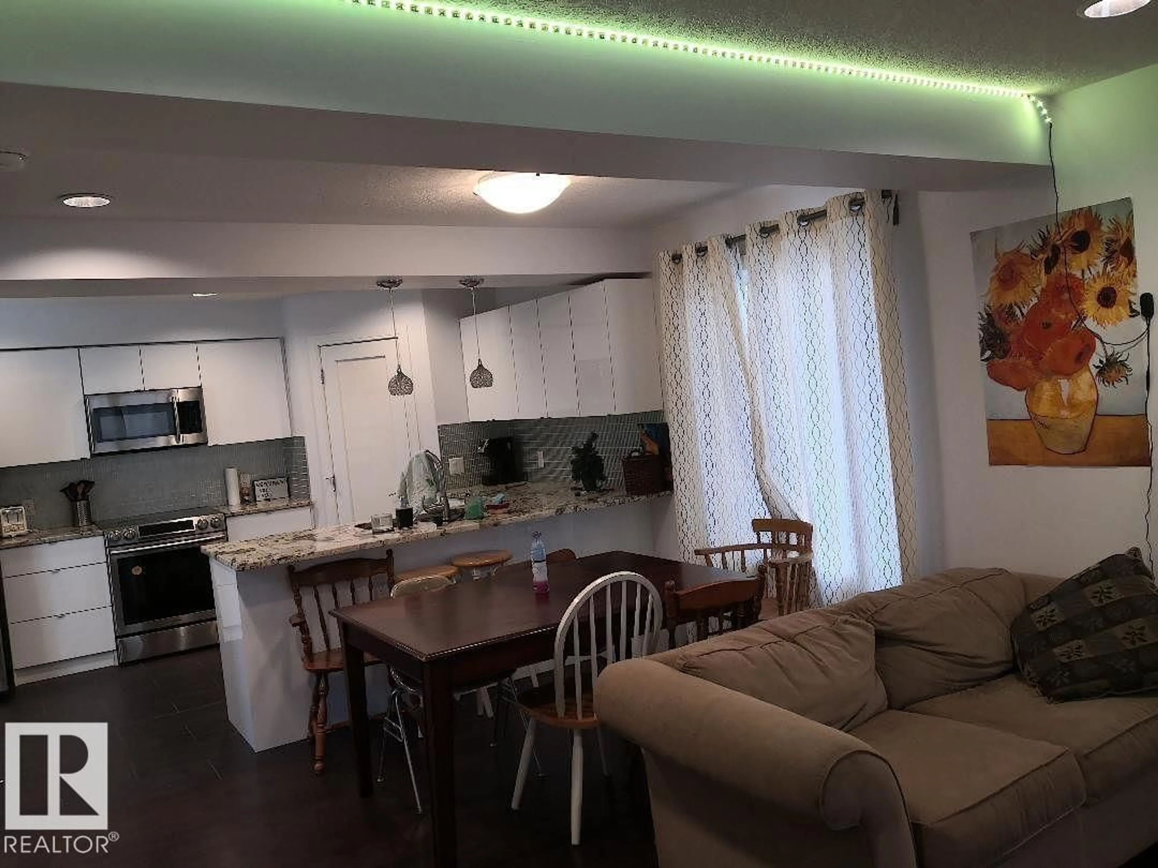 Open concept kitchen, unknown for 10922 81 AV, Edmonton Alberta T6G0S2