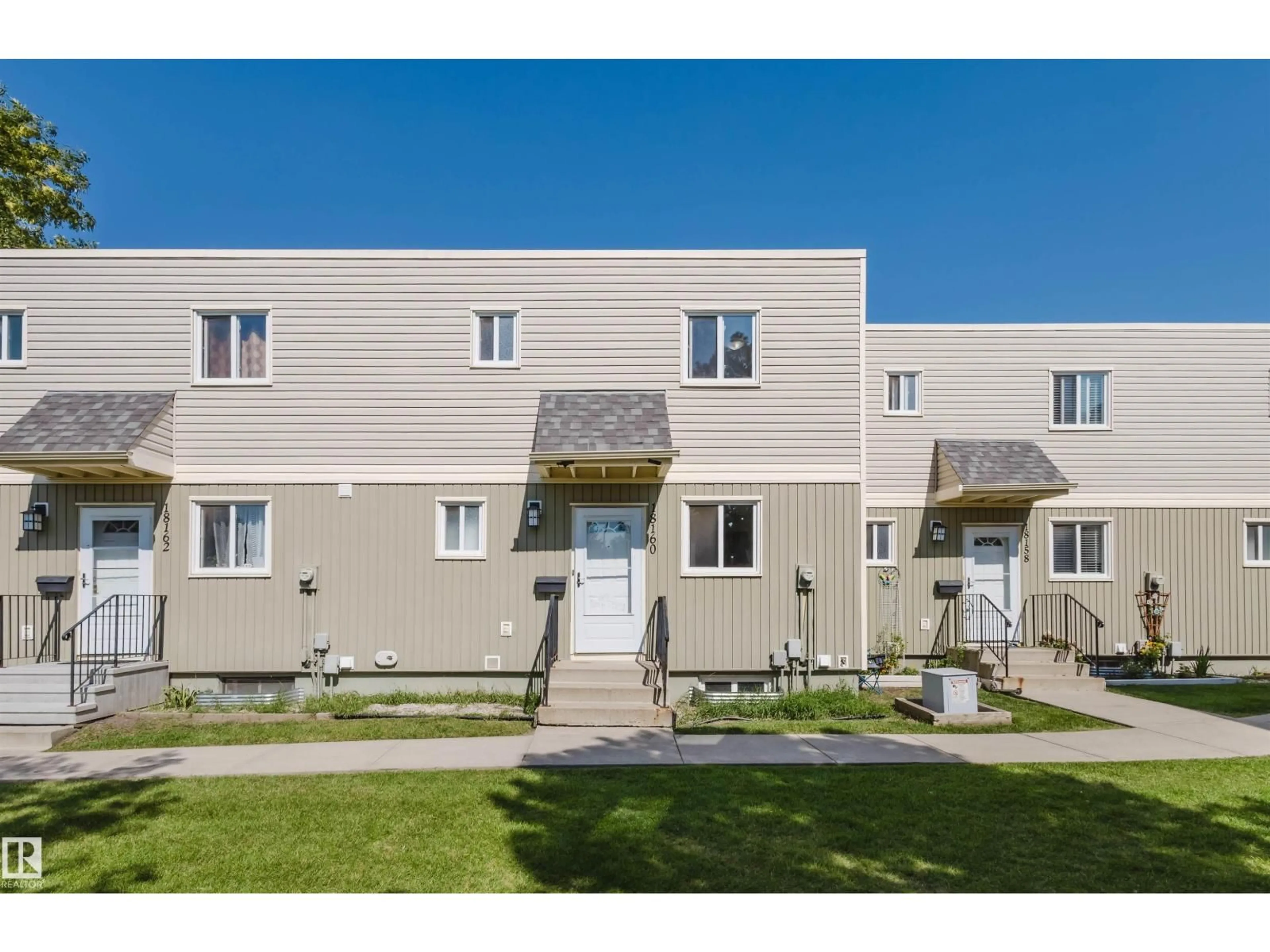 Home with vinyl exterior material, street for 18160 81 AV, Edmonton Alberta T5T1S4