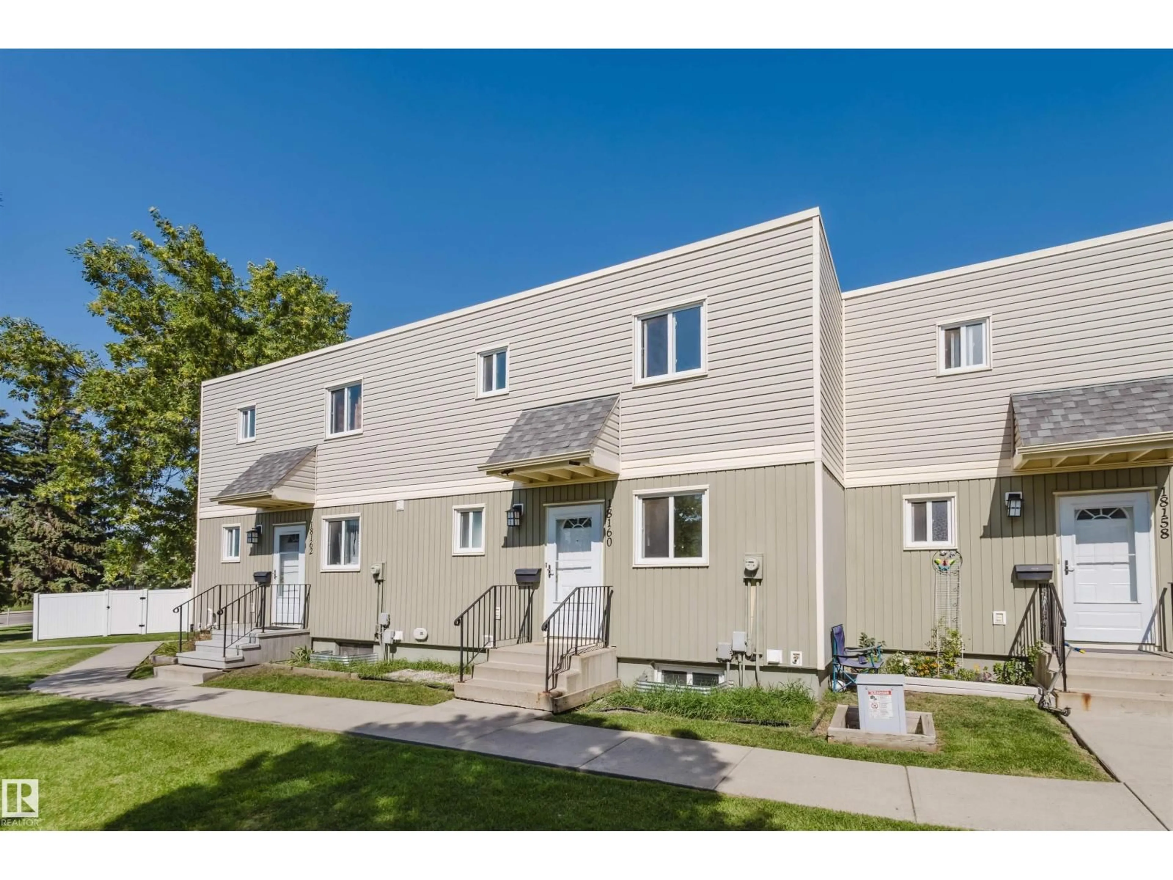 Home with vinyl exterior material, street for 18160 81 AV, Edmonton Alberta T5T1S4