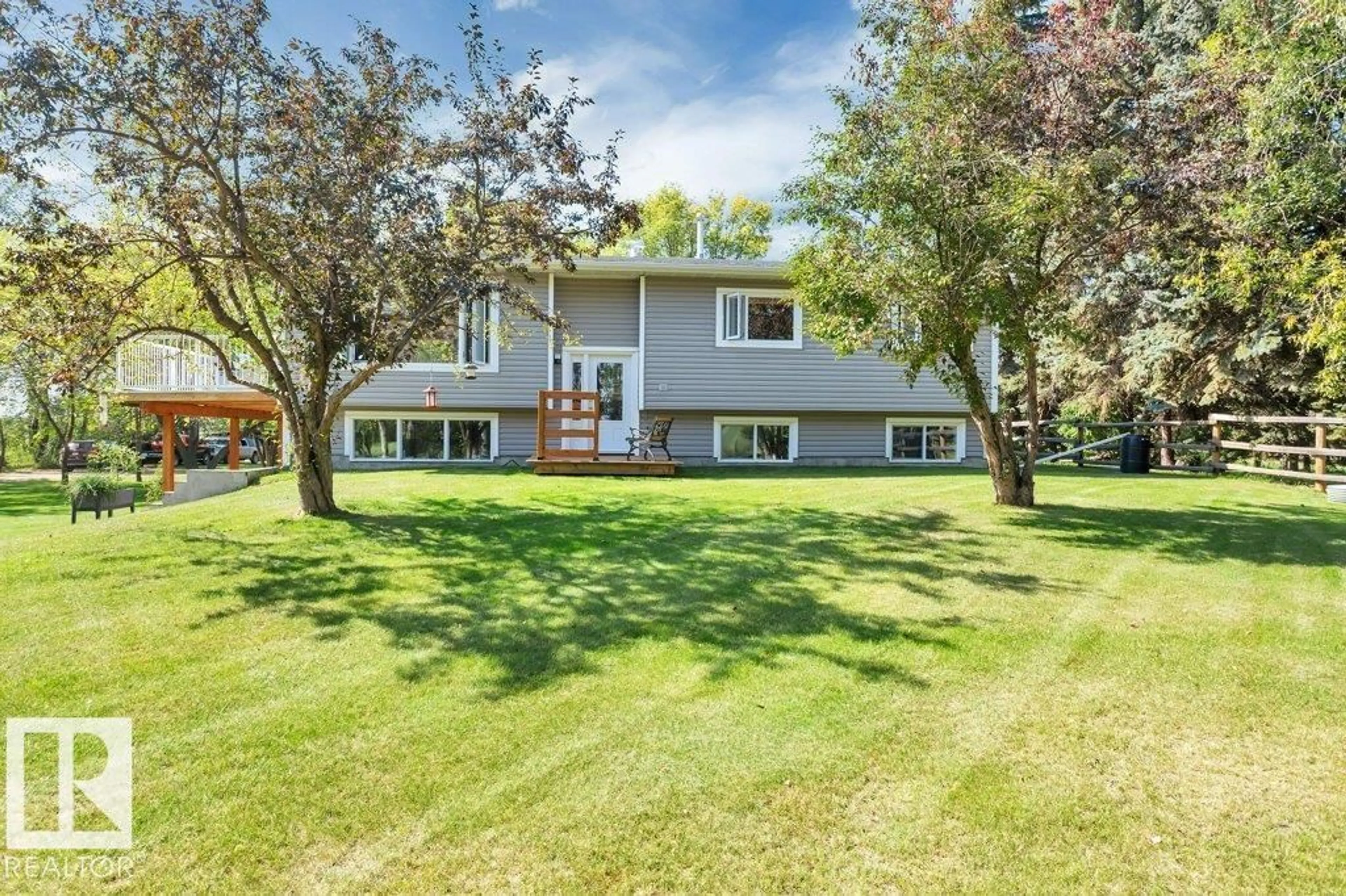 A pic from outside/outdoor area/front of a property/back of a property/a pic from drone, water/lake/river/ocean view for 463042 RGE ROAD 274, Rural Wetaskiwin County Alberta T0C1H0