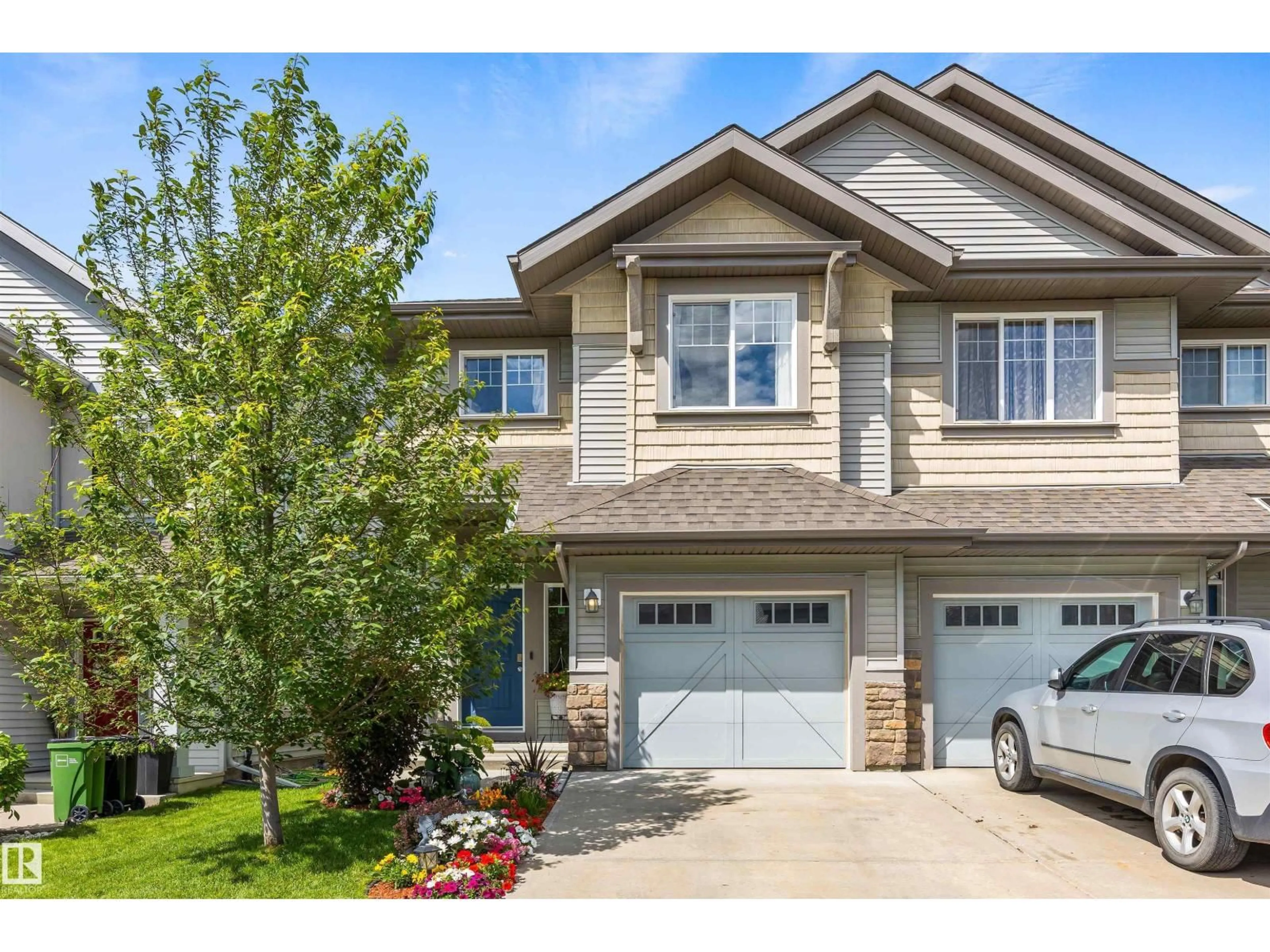 Home with vinyl exterior material, street for 771 EAGLESON CR, Edmonton Alberta T6M0V2