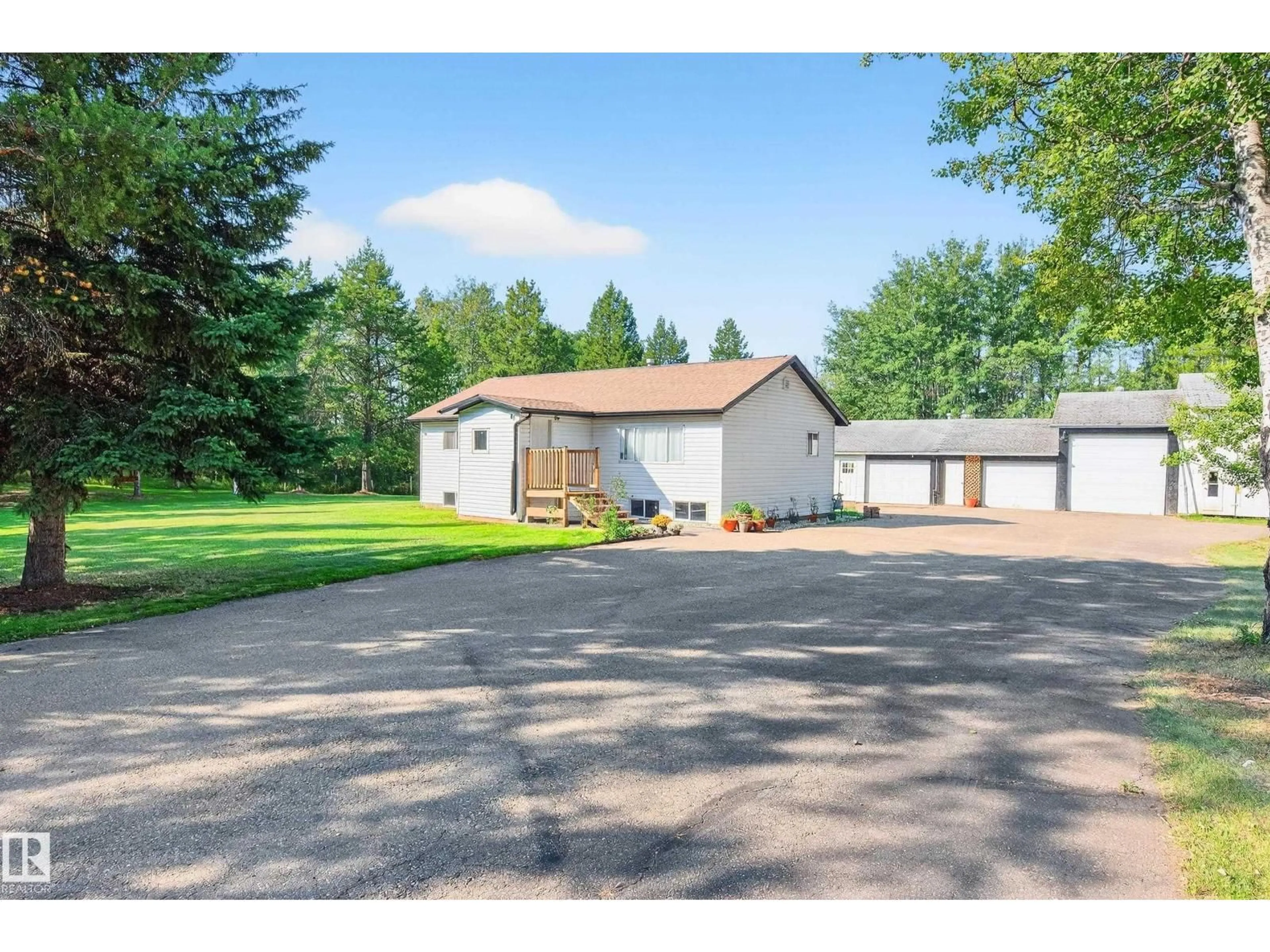 A pic from outside/outdoor area/front of a property/back of a property/a pic from drone, street for 53524 RGE ROAD 15, Rural Lac Ste. Anne County Alberta T0E1V0