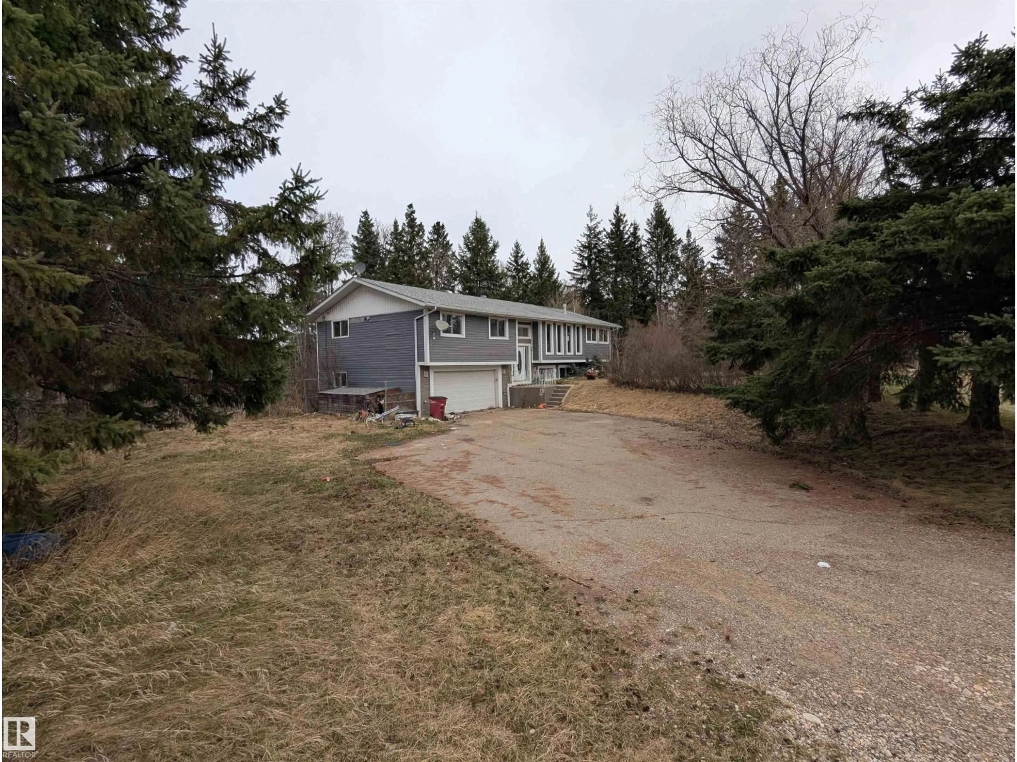 A pic from outside/outdoor area/front of a property/back of a property/a pic from drone, street for #2 - 52414 RGE ROAD 20, Rural Parkland County Alberta T0E0H0