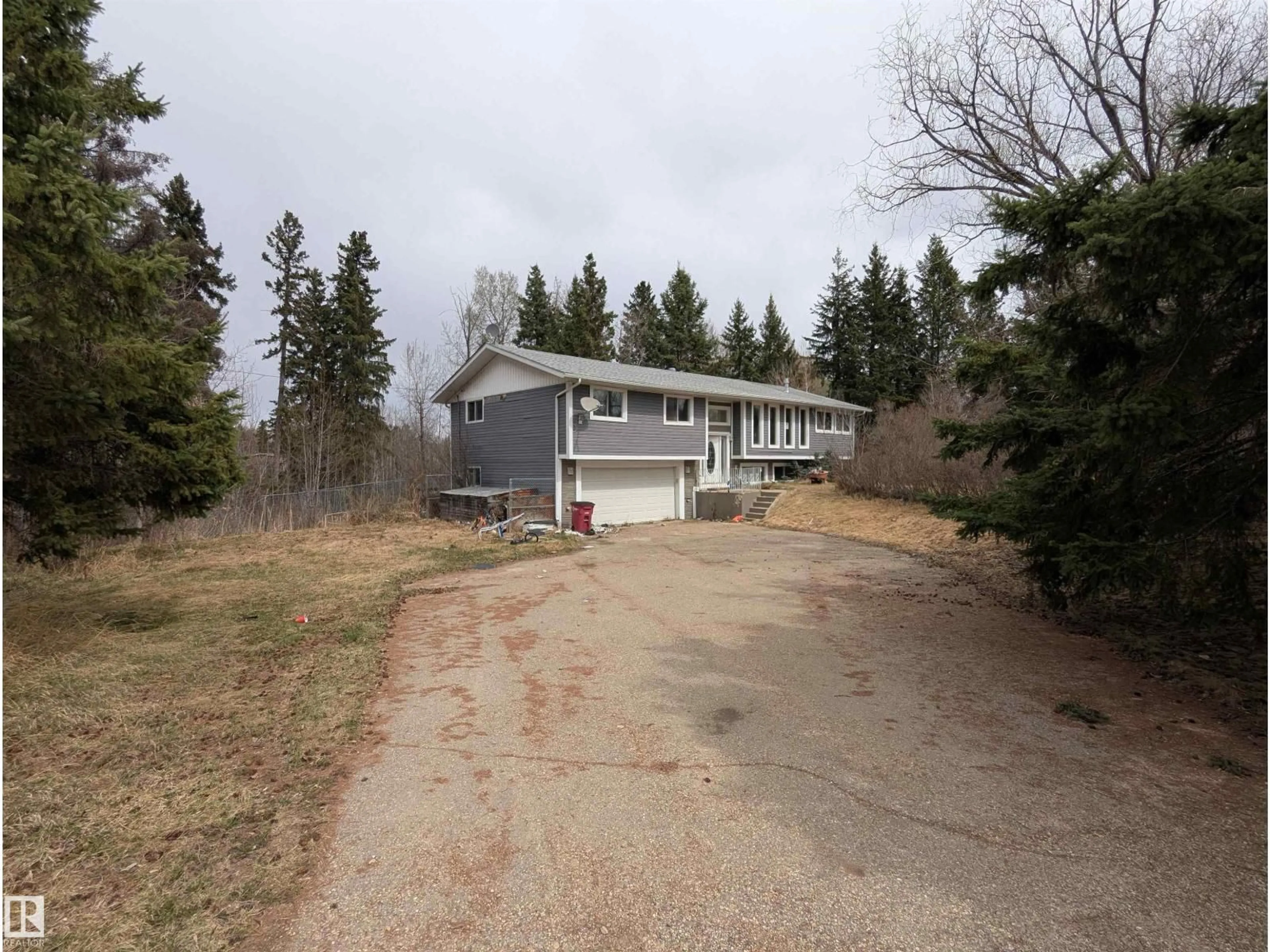 A pic from outside/outdoor area/front of a property/back of a property/a pic from drone, street for #2 - 52414 RGE ROAD 20, Rural Parkland County Alberta T0E0H0