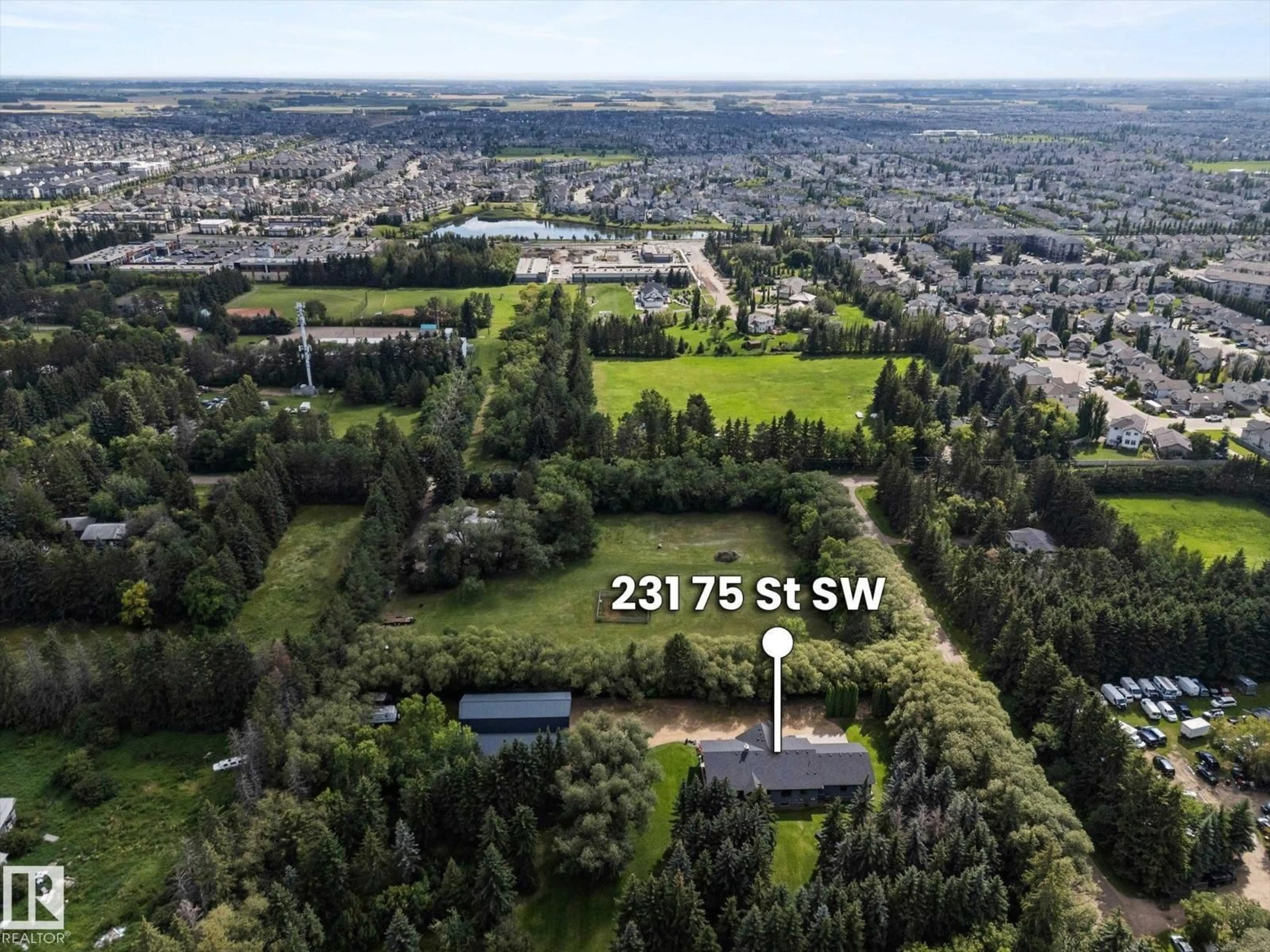 A pic from outside/outdoor area/front of a property/back of a property/a pic from drone, forest/trees view for 231 75 ST, Edmonton Alberta T6X1A3
