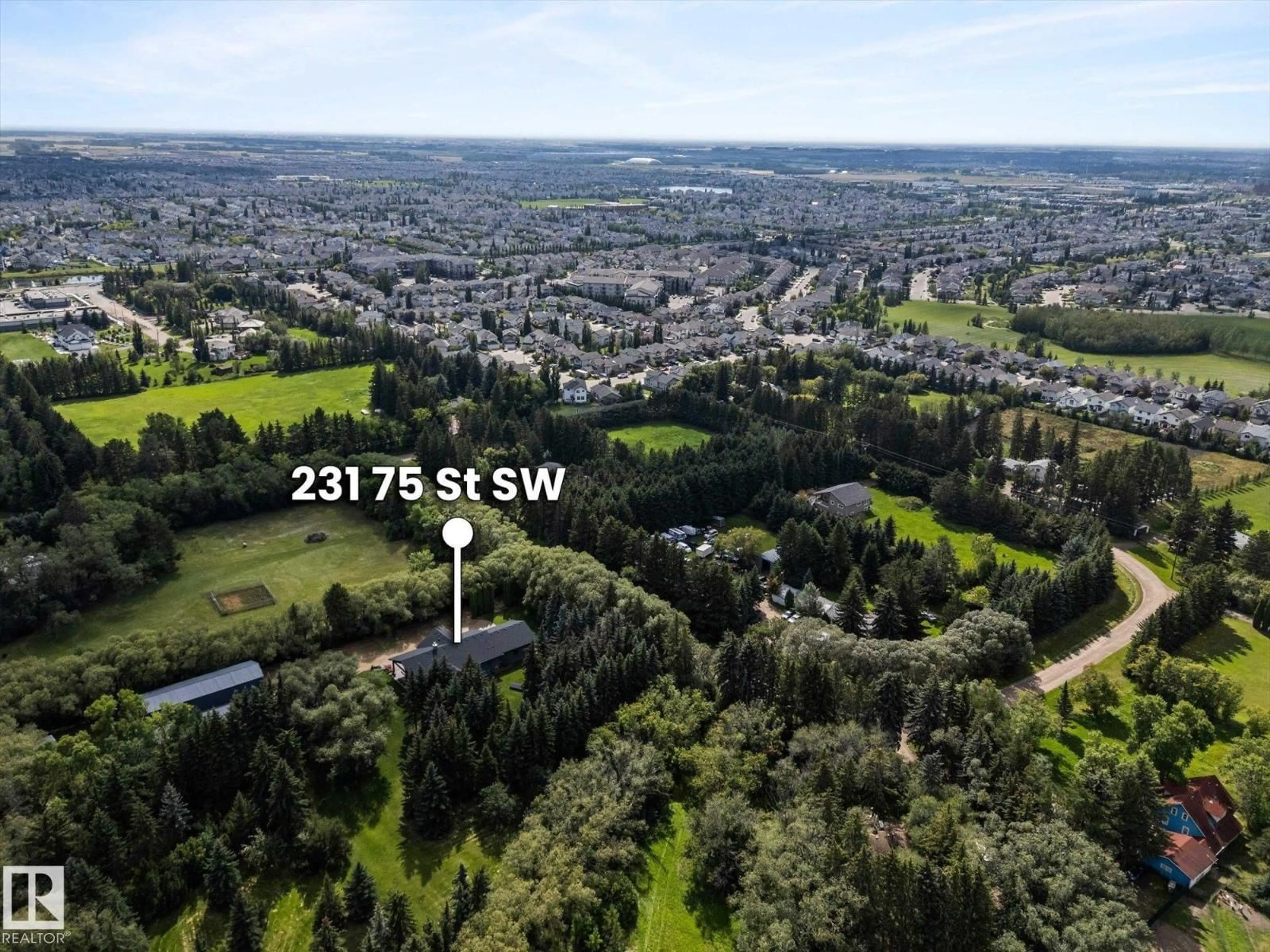 A pic from outside/outdoor area/front of a property/back of a property/a pic from drone, forest/trees view for 231 75 ST, Edmonton Alberta T6X1A3