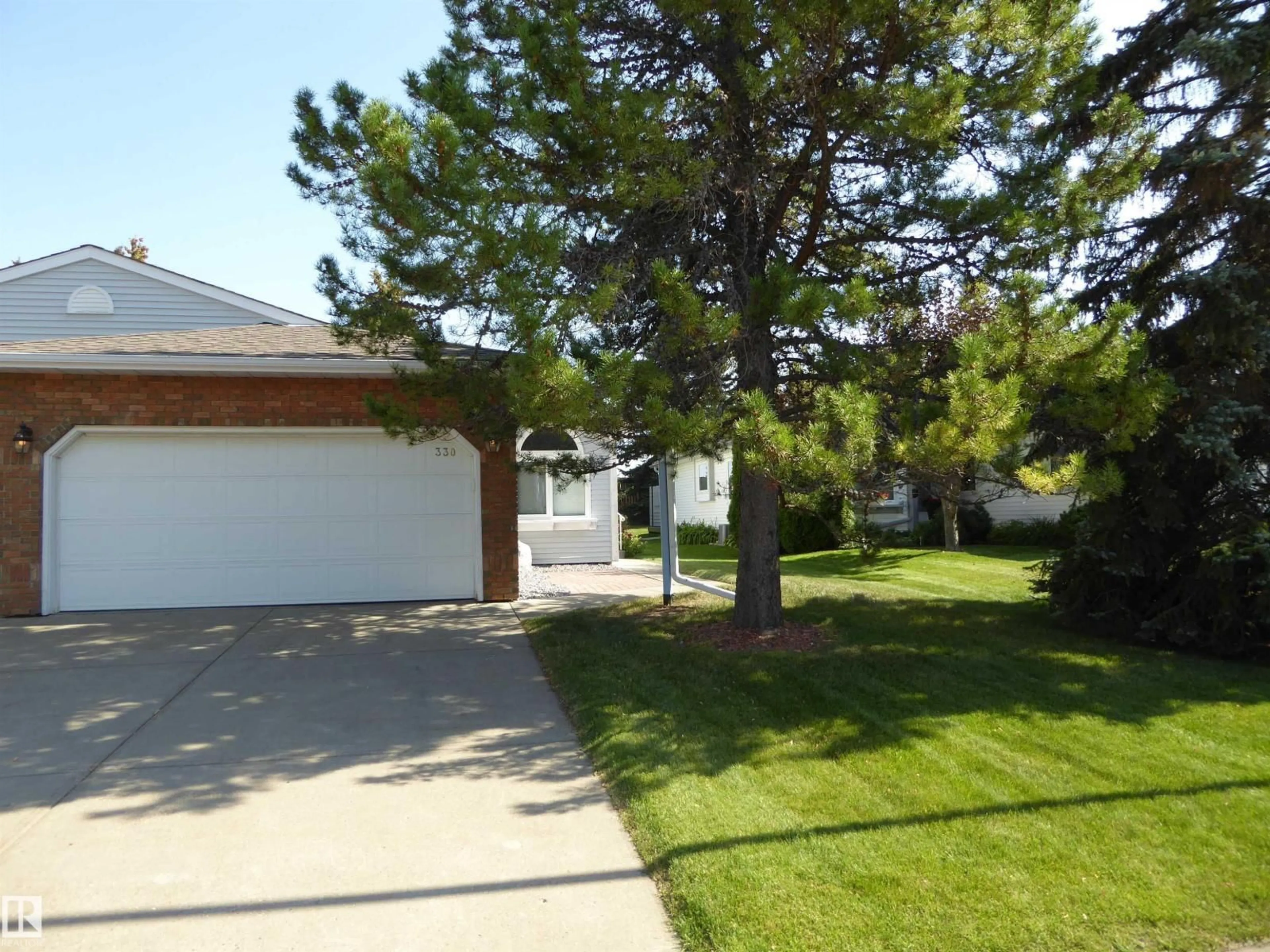 A pic from outside/outdoor area/front of a property/back of a property/a pic from drone, street for 330 REHWINKEL CL, Edmonton Alberta T6R1Y9