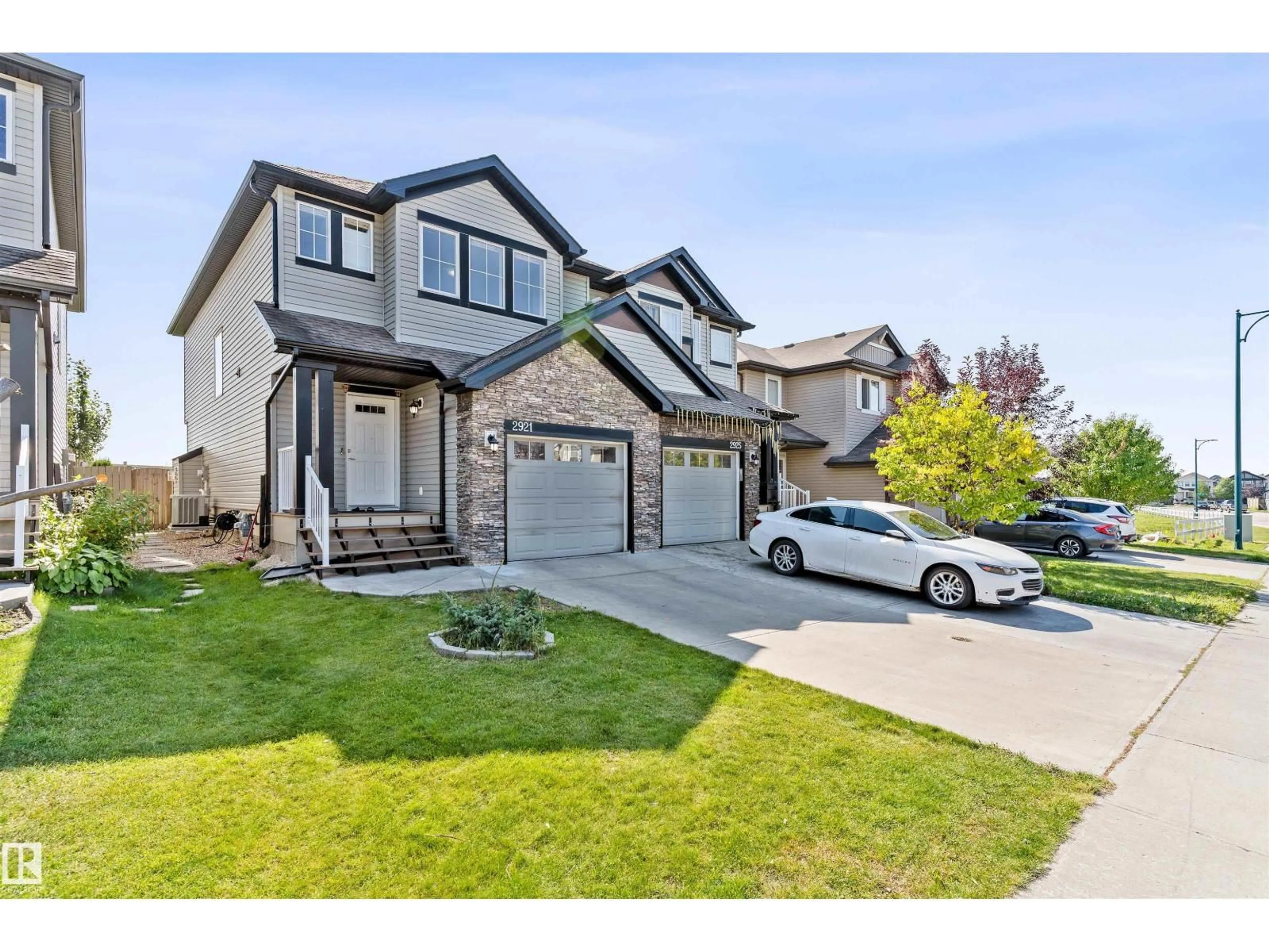 Home with vinyl exterior material, street for 2921 18A AV, Edmonton Alberta T6T0N8