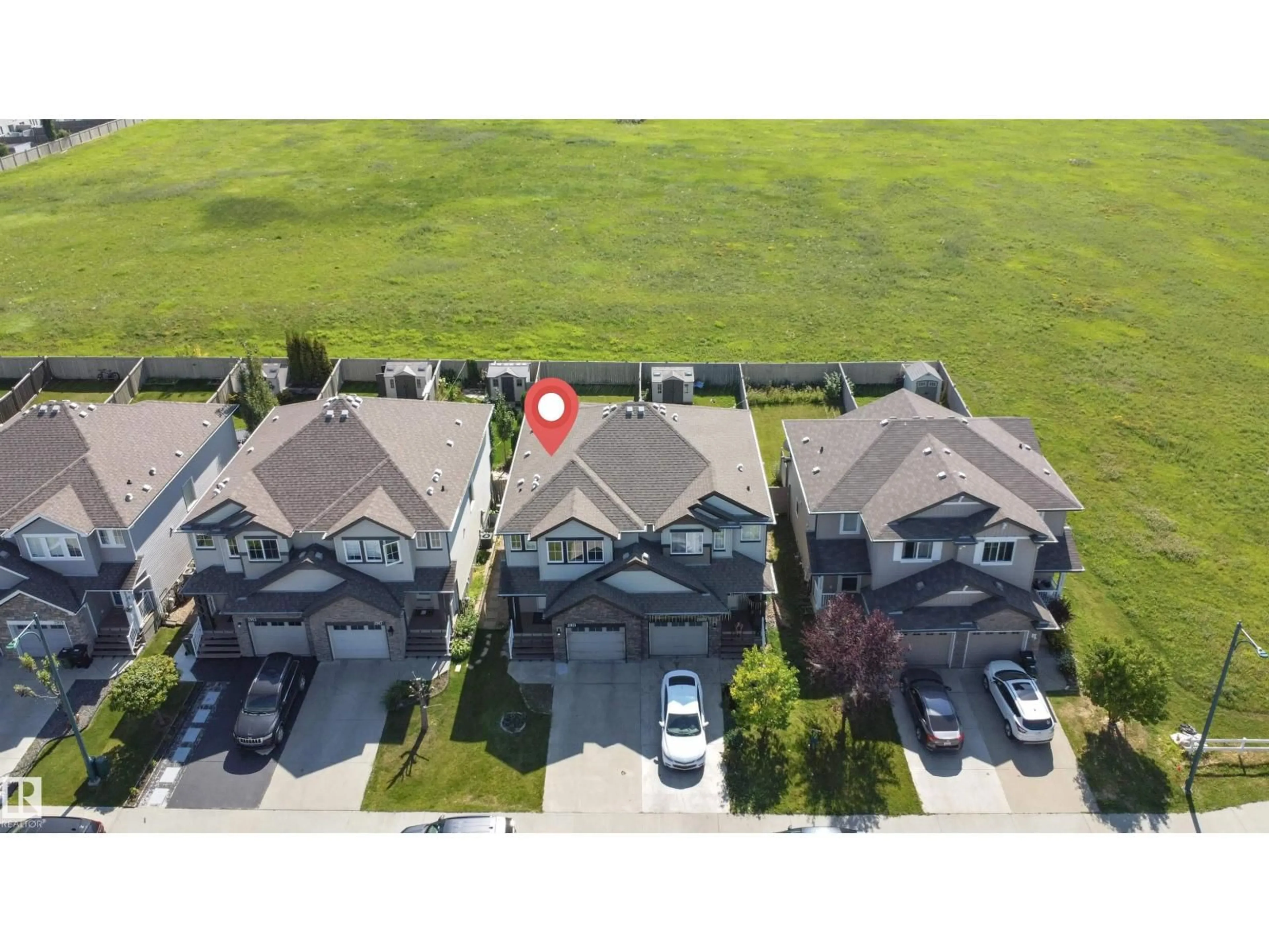 A pic from outside/outdoor area/front of a property/back of a property/a pic from drone, street for 2921 18A AV, Edmonton Alberta T6T0N8