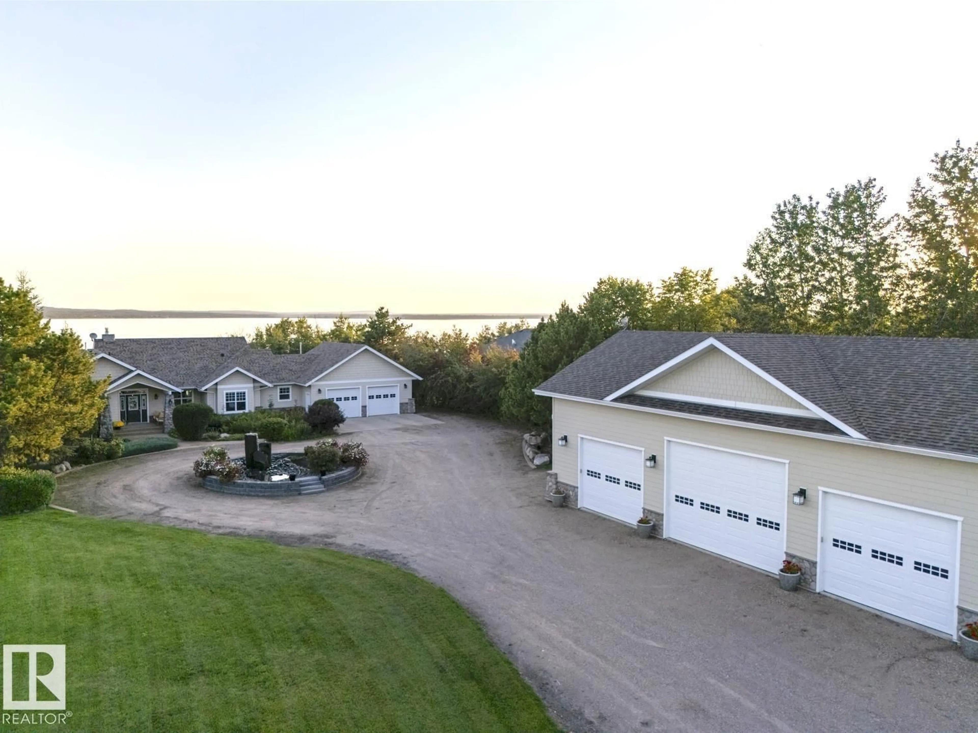 A pic from outside/outdoor area/front of a property/back of a property/a pic from drone, water/lake/river/ocean view for #27 - 46511 TWP RD 611, Rural Bonnyville M.D. Alberta T9N2J6