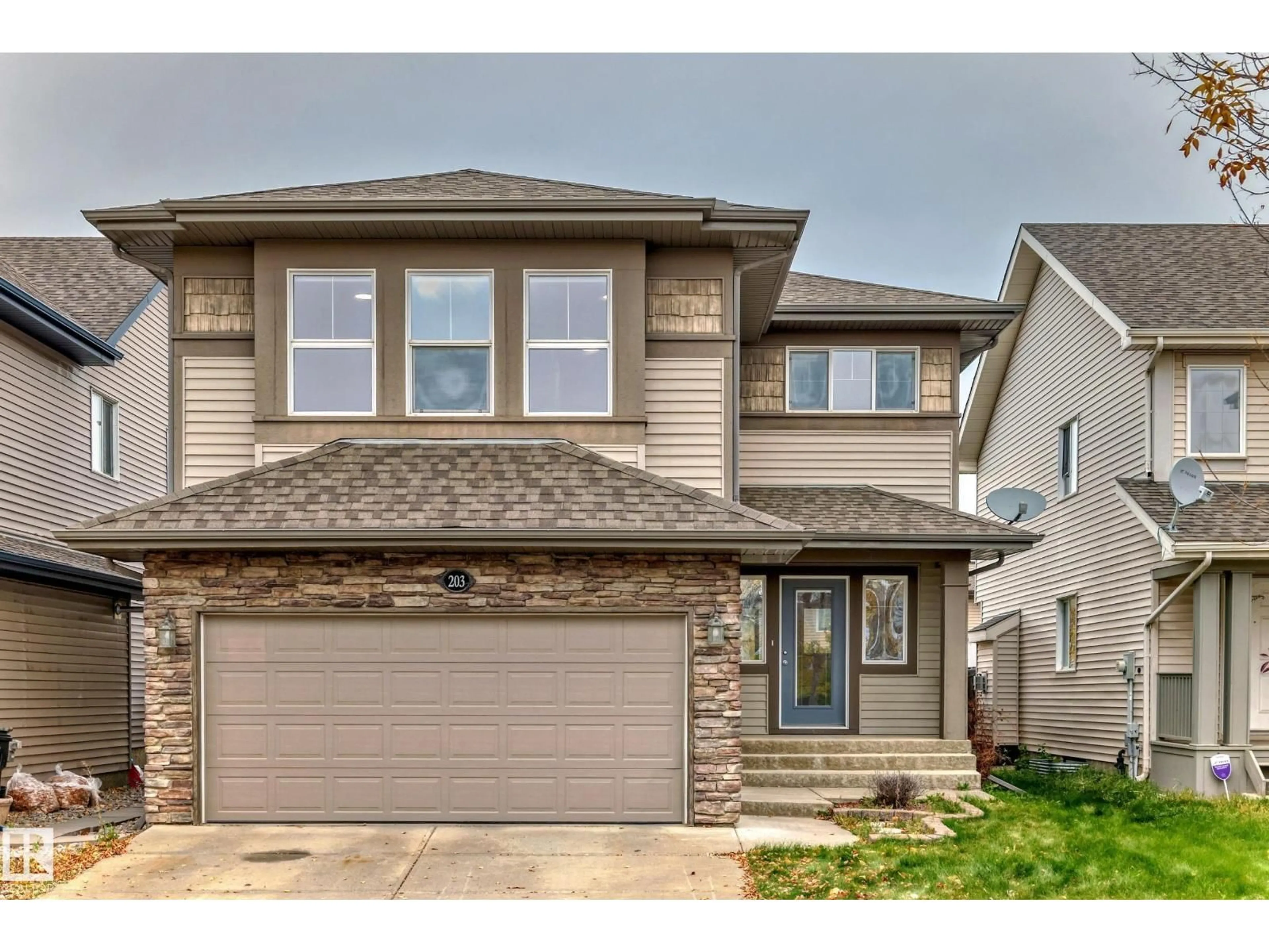 Home with vinyl exterior material, street for 203 CALDWELL WY, Edmonton Alberta T6M2X2