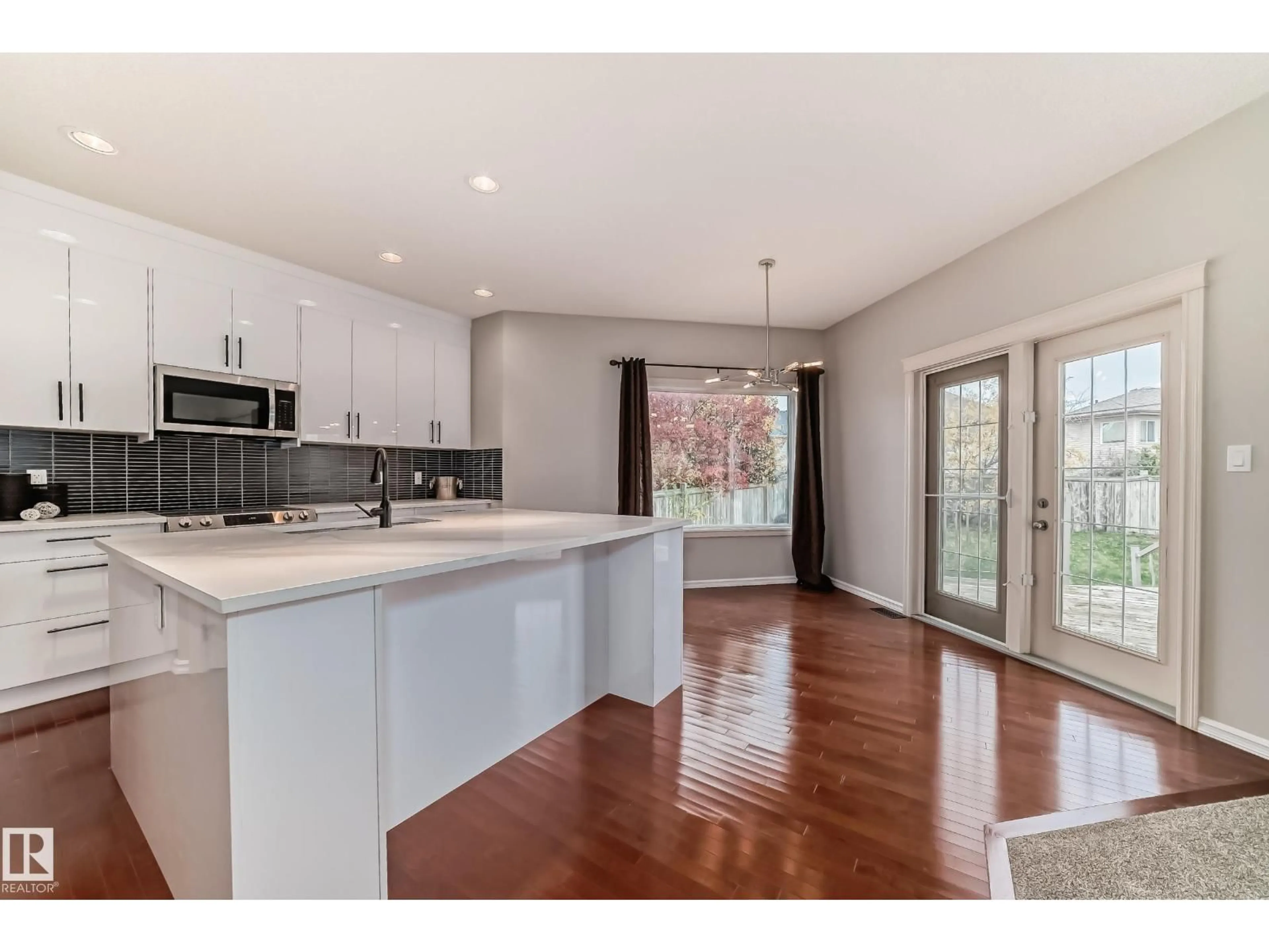 Open concept kitchen, unknown for 203 CALDWELL WY, Edmonton Alberta T6M2X2