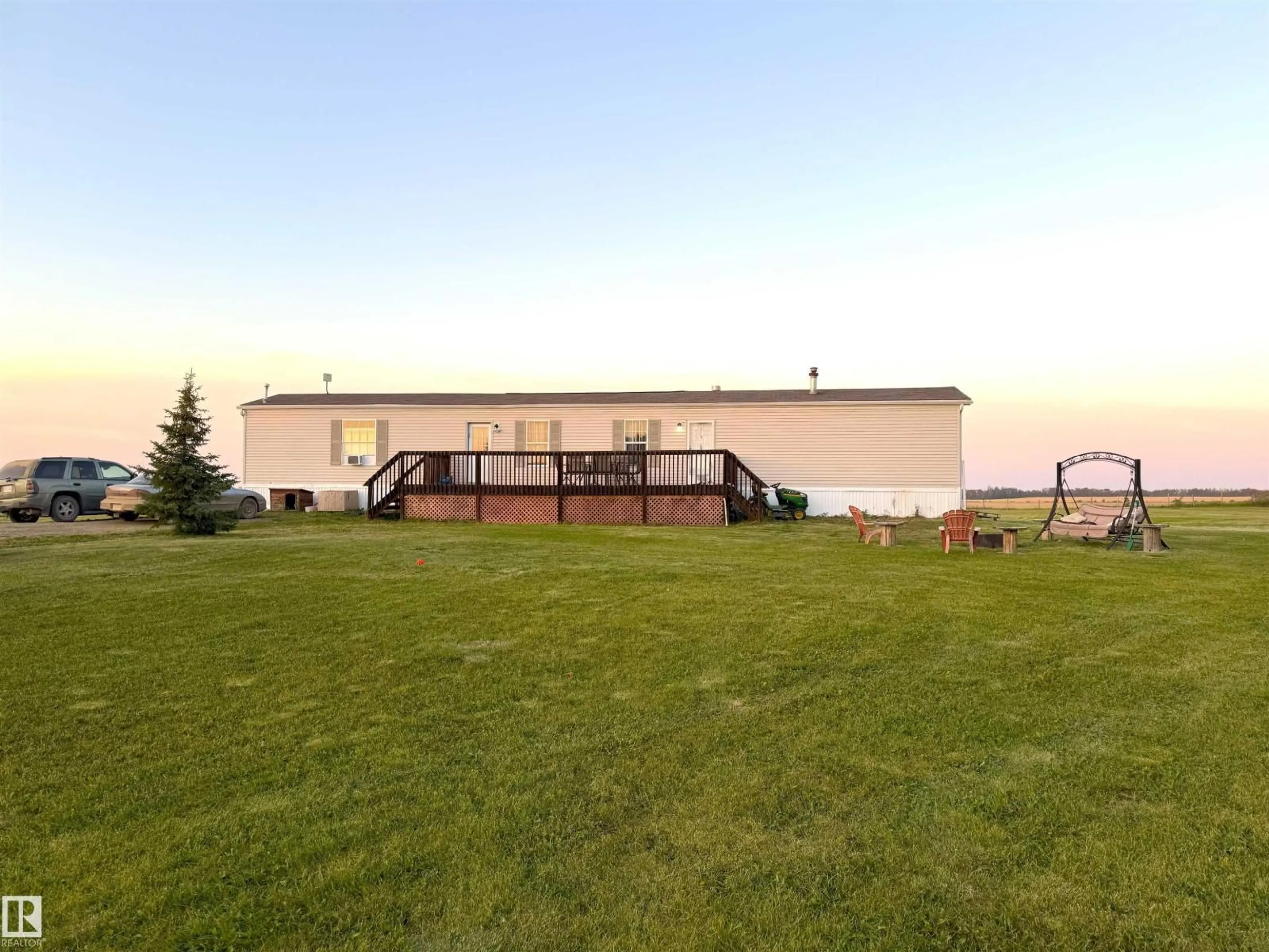 A pic from outside/outdoor area/front of a property/back of a property/a pic from drone, water/lake/river/ocean view for 48041 RGE ROAD 264, Rural Leduc County Alberta T0C0V0