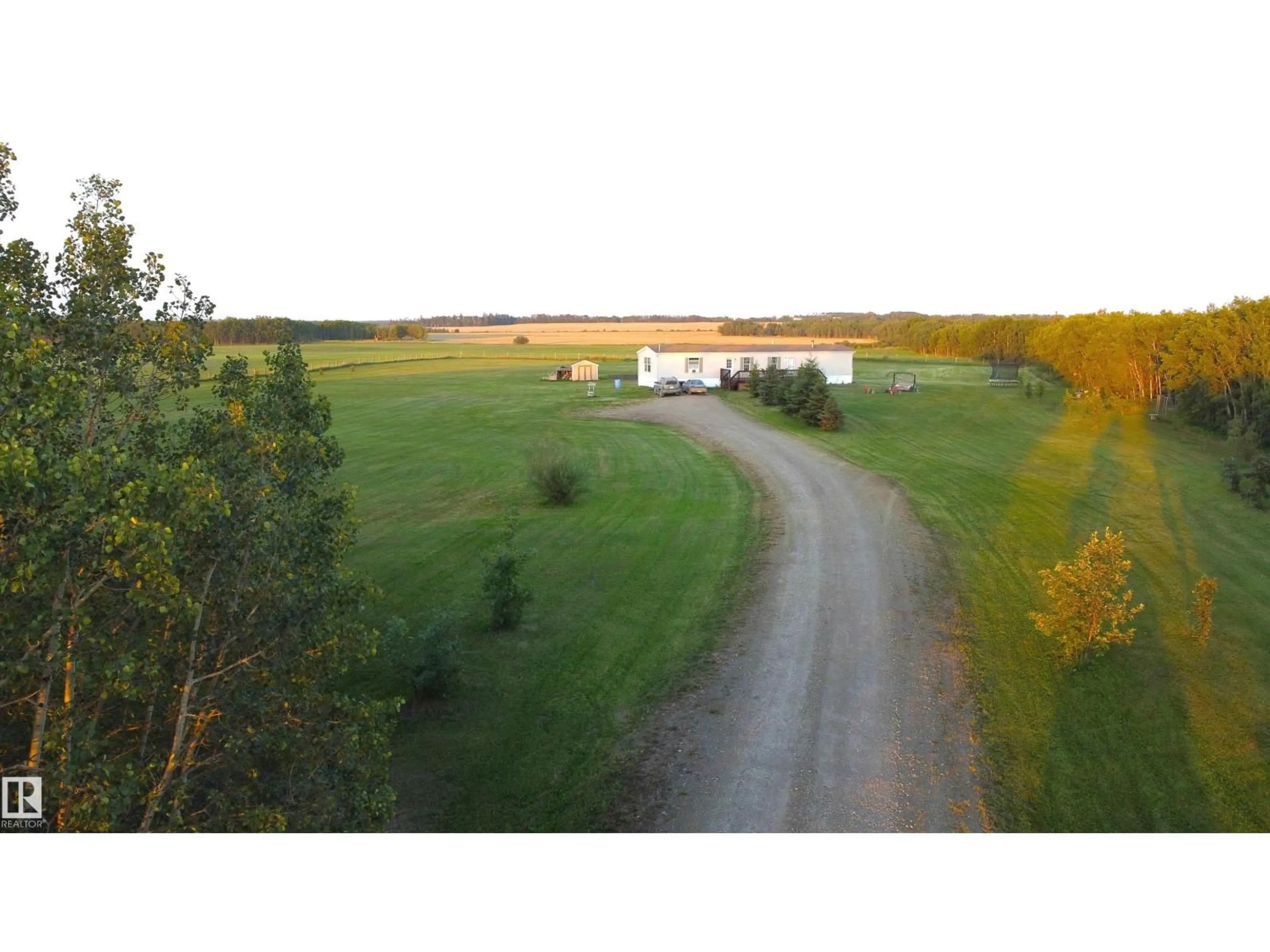 A pic from outside/outdoor area/front of a property/back of a property/a pic from drone, unknown for 48041 RGE ROAD 264, Rural Leduc County Alberta T0C0V0