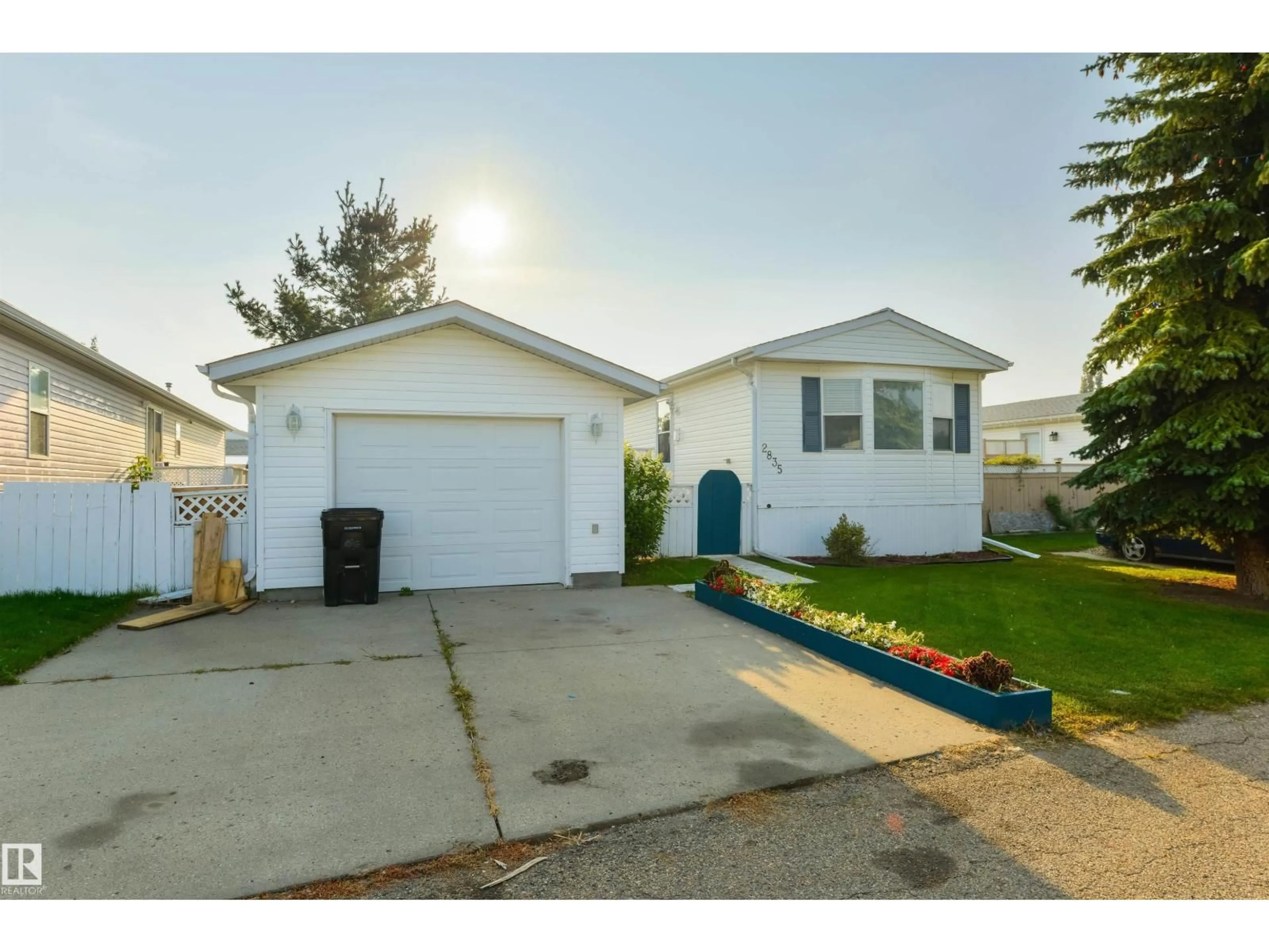 Home with vinyl exterior material, street for 2835 LAKESIDE CL, Edmonton Alberta T5S1T7