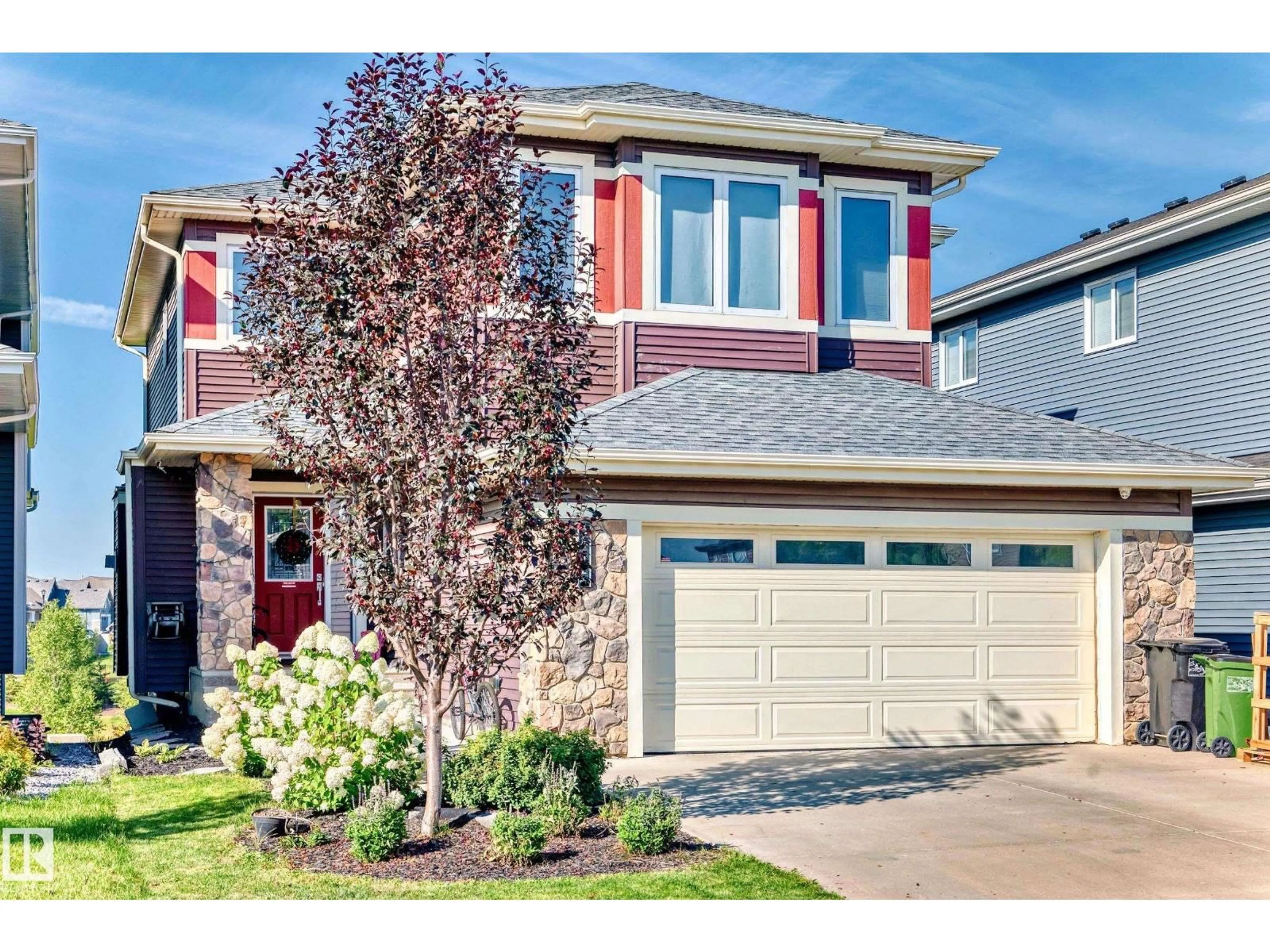 Home with vinyl exterior material, street for NW - 8412 218 ST, Edmonton Alberta T5T4R9