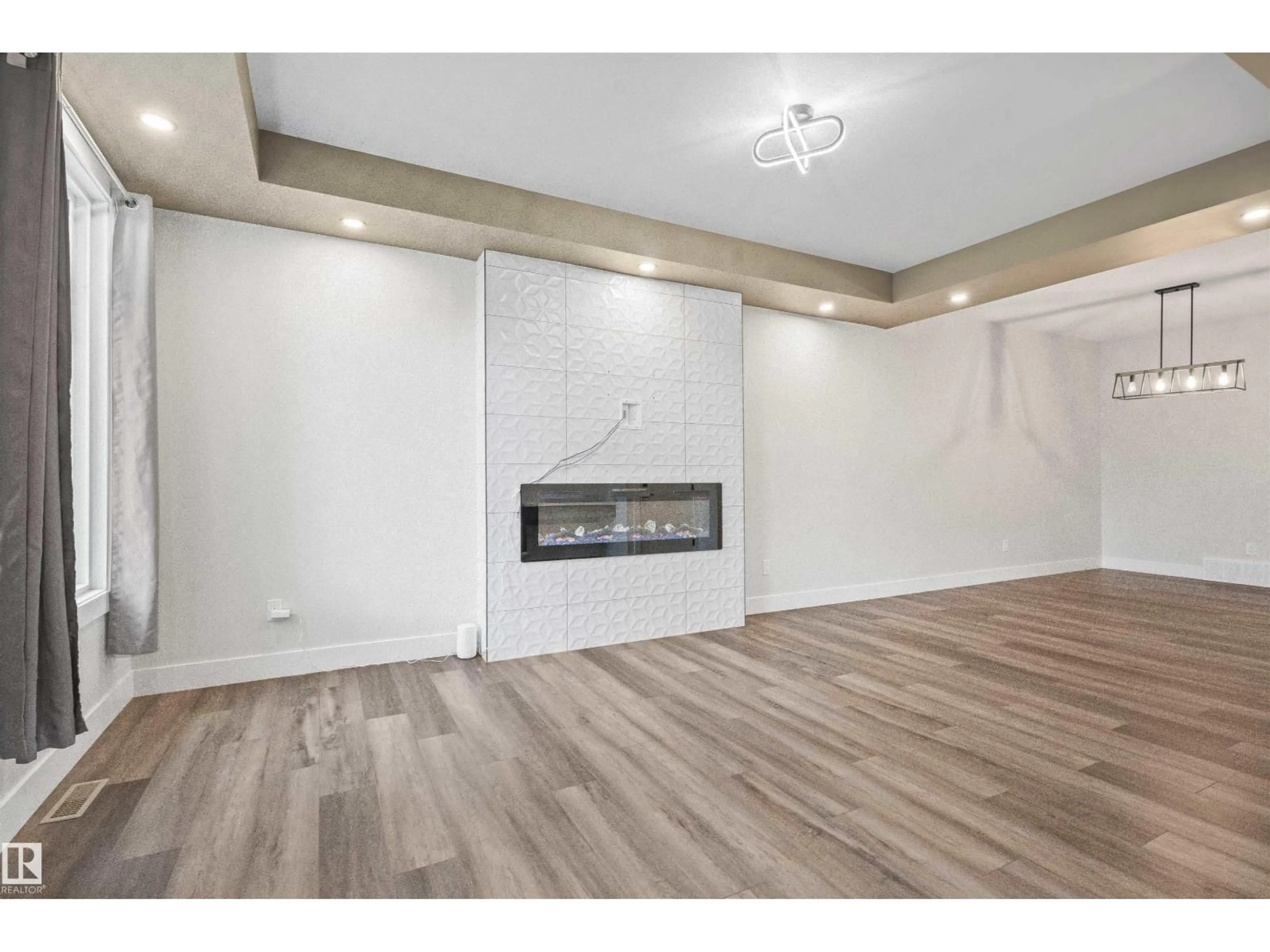 A pic of a room for NW - 12045 65 ST, Edmonton Alberta T5W4L6