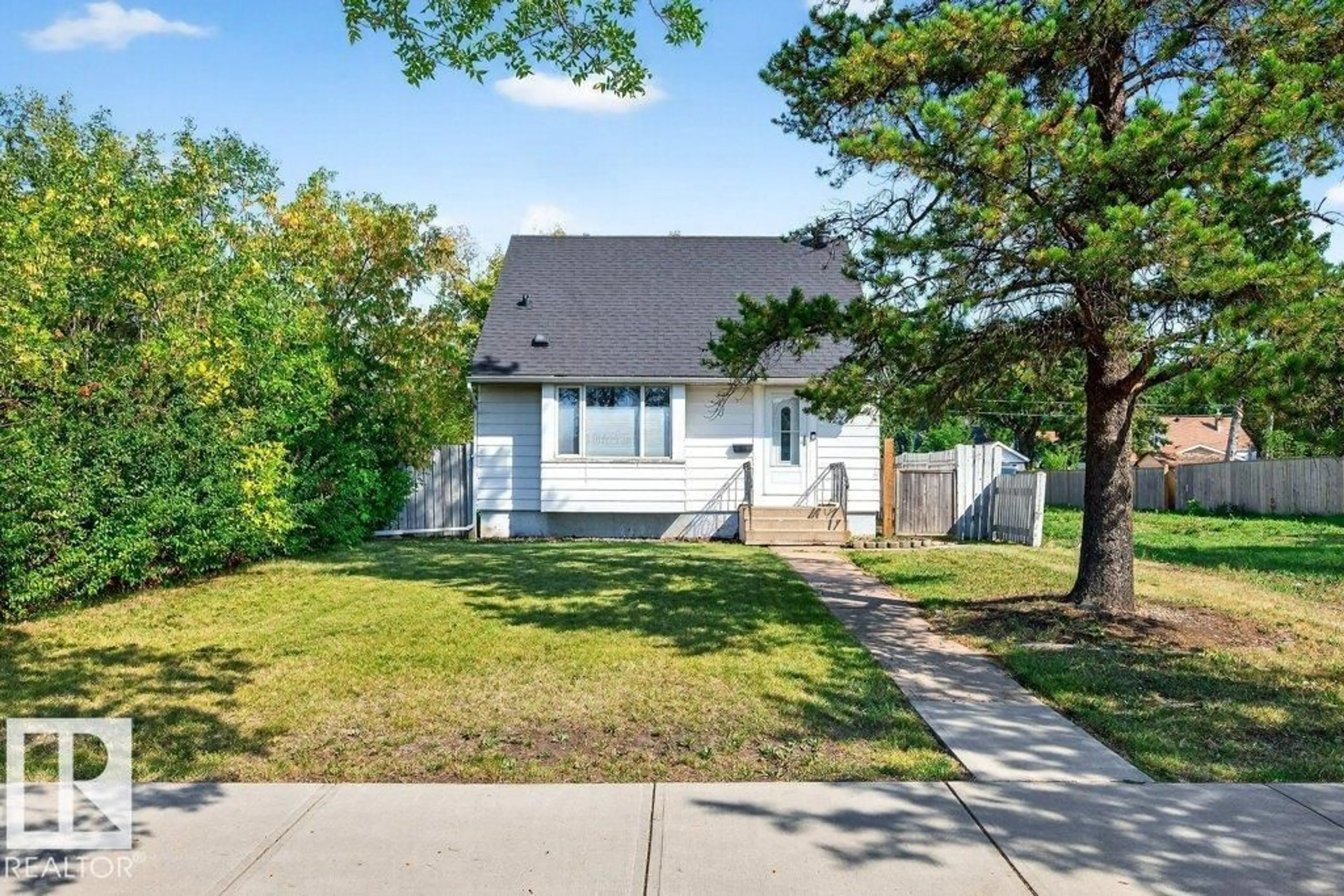 Home with vinyl exterior material, street for NW - 12247 107 ST, Edmonton Alberta T5G2S9