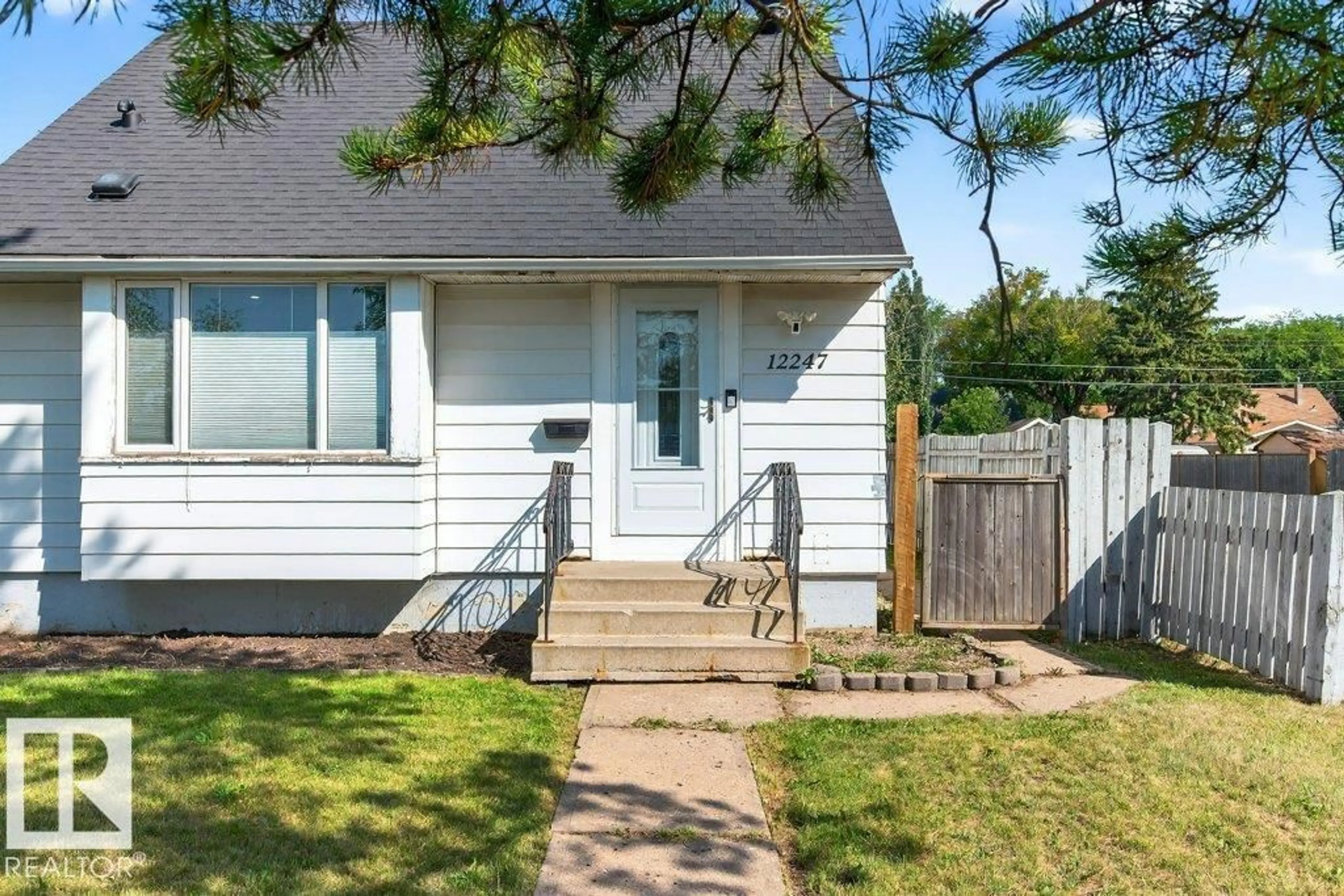 Home with vinyl exterior material, street for NW - 12247 107 ST, Edmonton Alberta T5G2S9