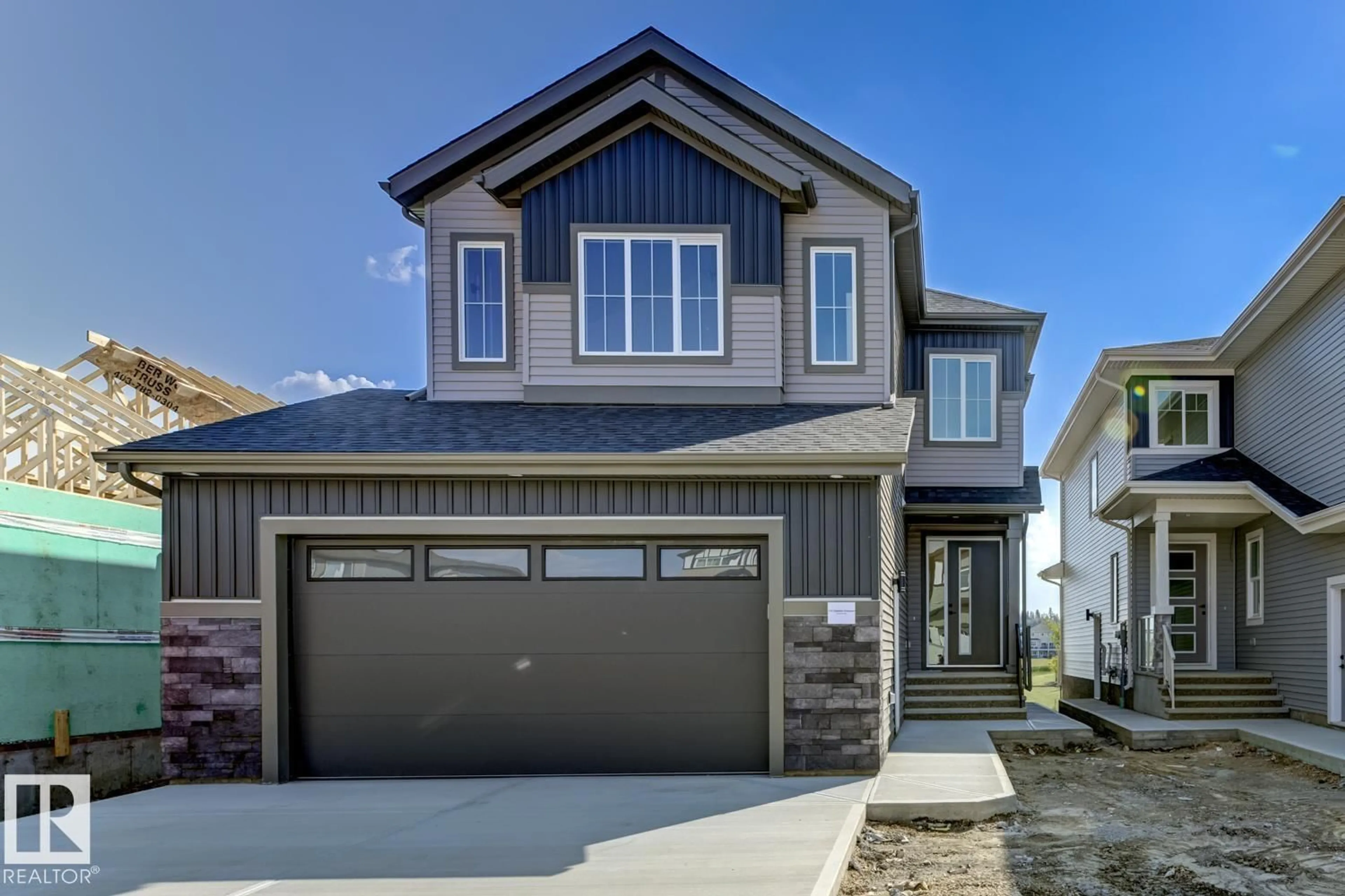 Home with vinyl exterior material, street for 174 CALEDON CR, Spruce Grove Alberta T7X0Y6