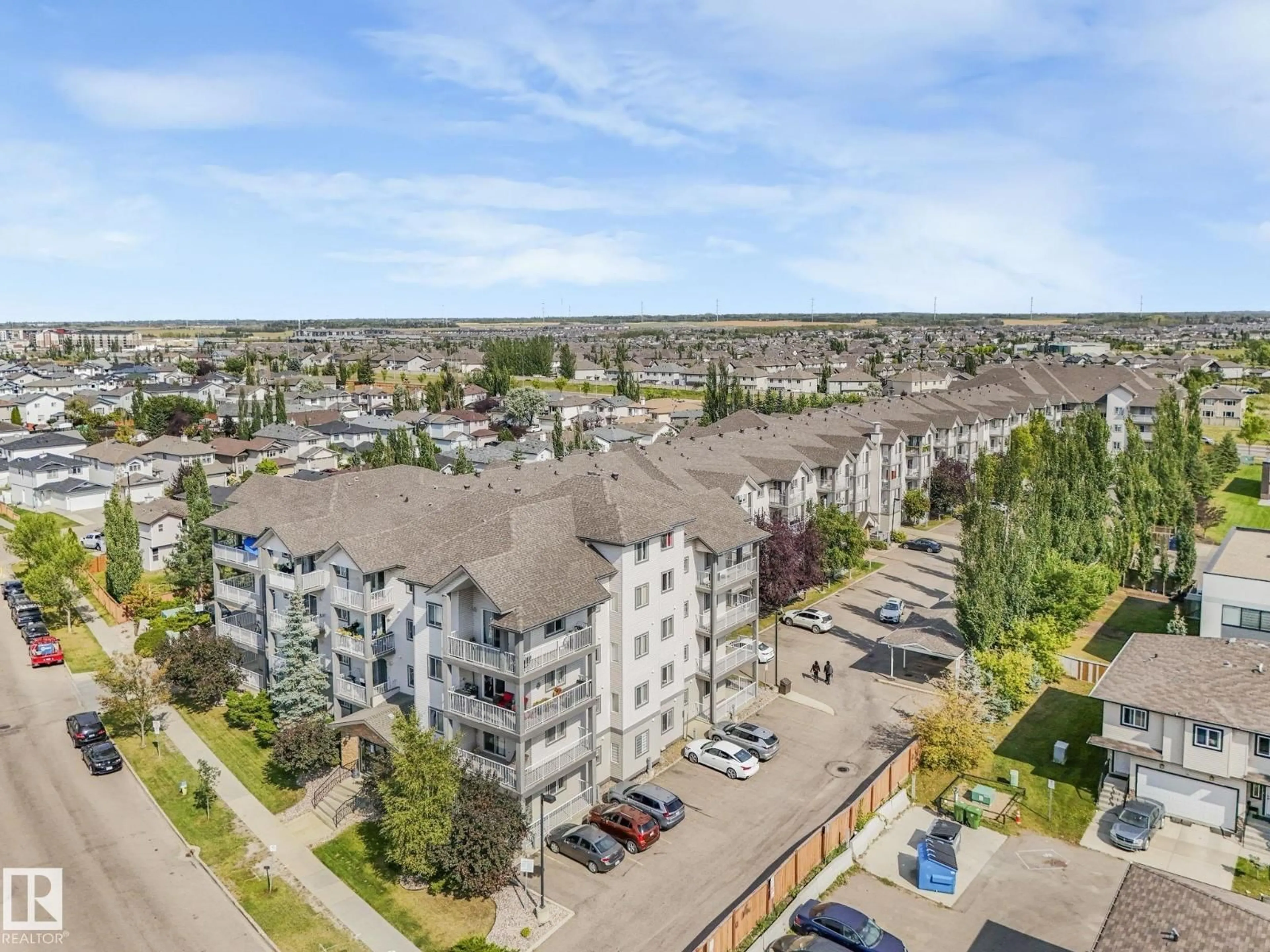 A pic from outside/outdoor area/front of a property/back of a property/a pic from drone, city buildings view from balcony for 428 - 3425 19 ST NW, Edmonton Alberta T5Y3Z9