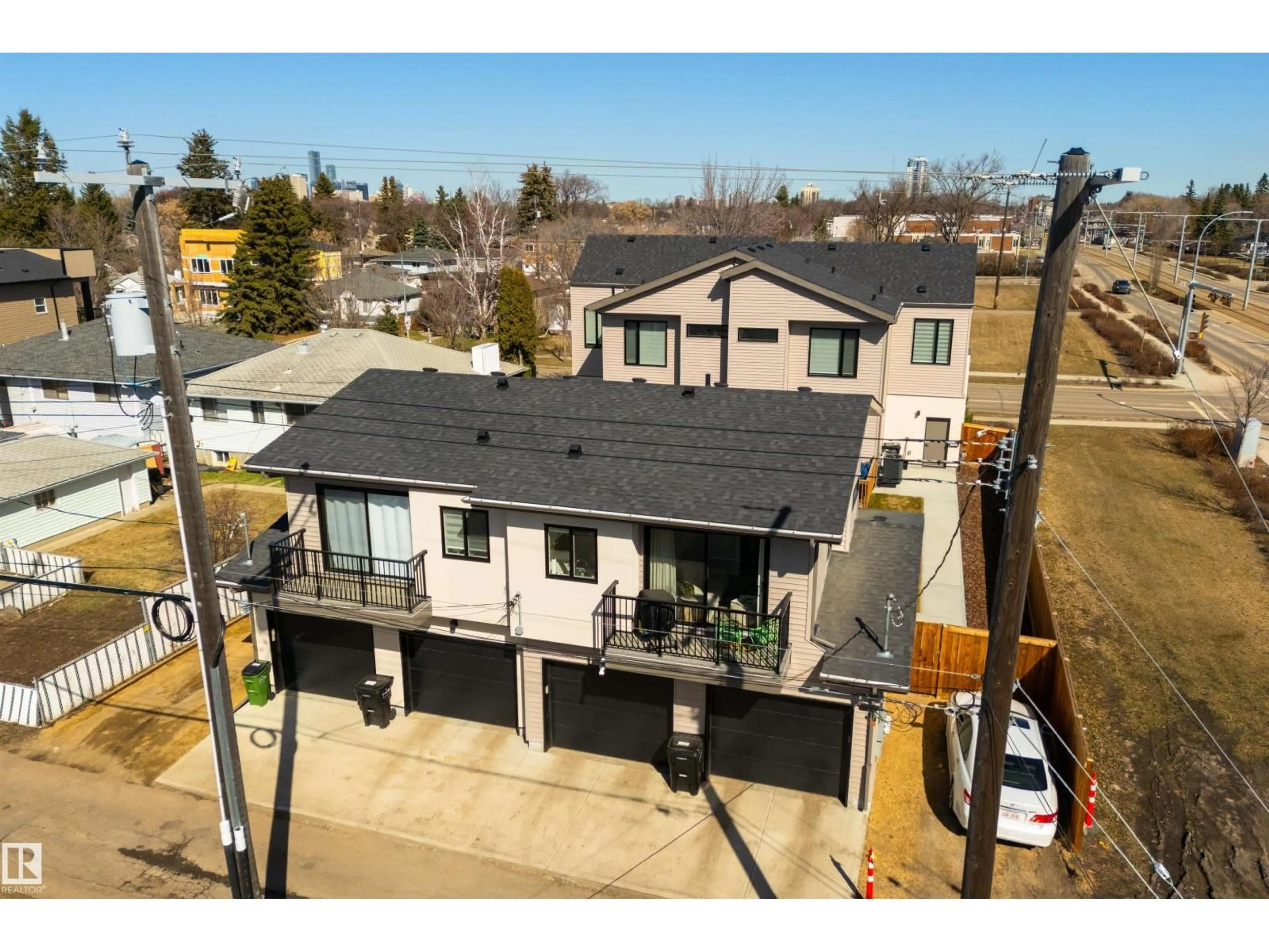 A pic from outside/outdoor area/front of a property/back of a property/a pic from drone, street for 8311 & 8313 76 AV, Edmonton Alberta T6C0H9