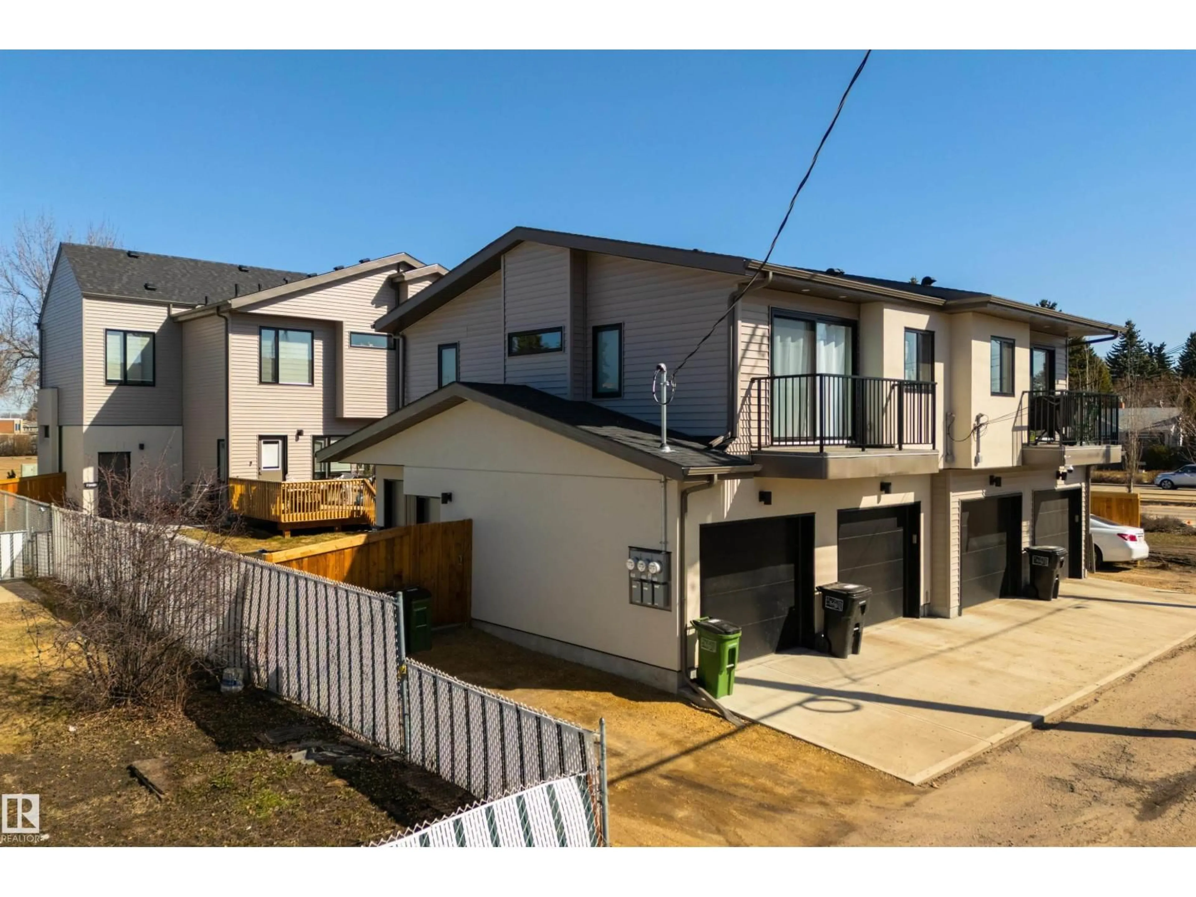 A pic from outside/outdoor area/front of a property/back of a property/a pic from drone, street for 8311 & 8313 76 AV, Edmonton Alberta T6C0H9