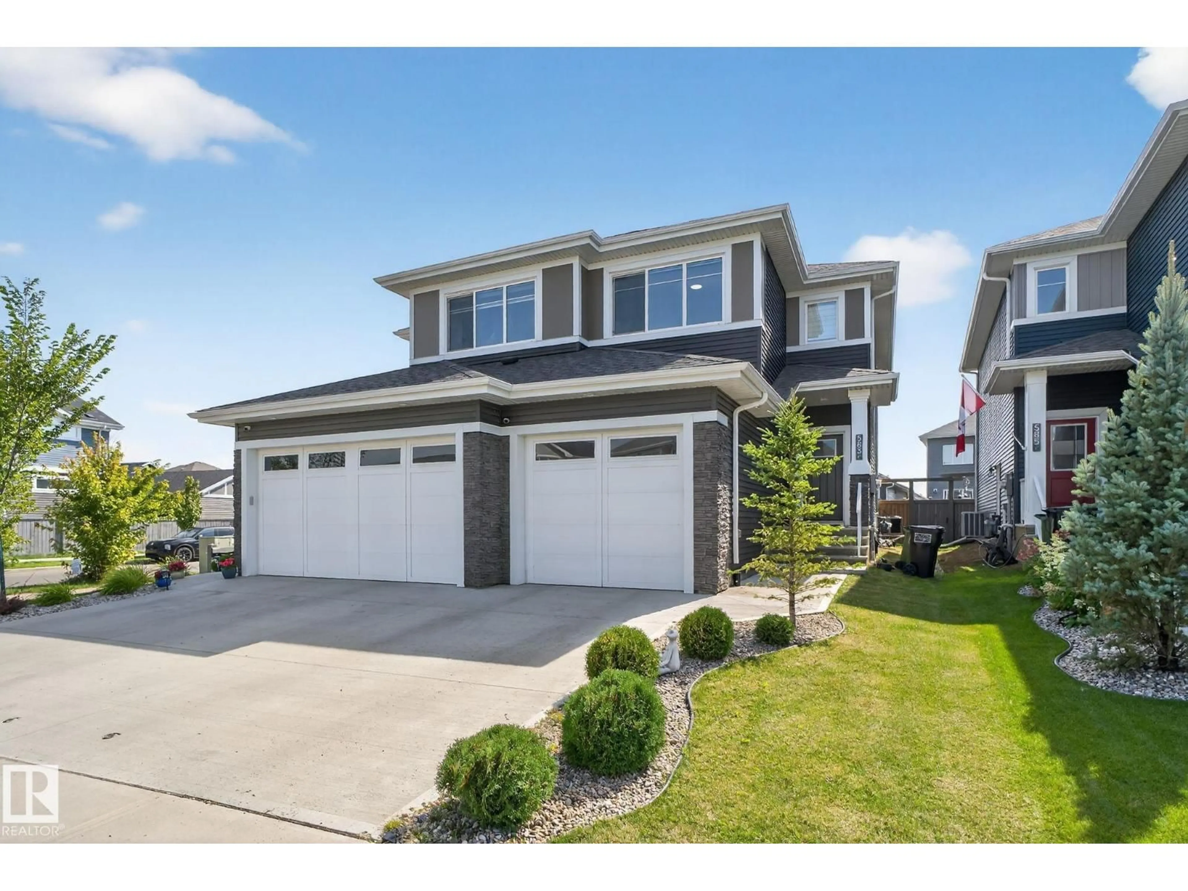 Home with vinyl exterior material, street for 583 GLENRIDDING RAVINE DR, Edmonton Alberta T6W4N9