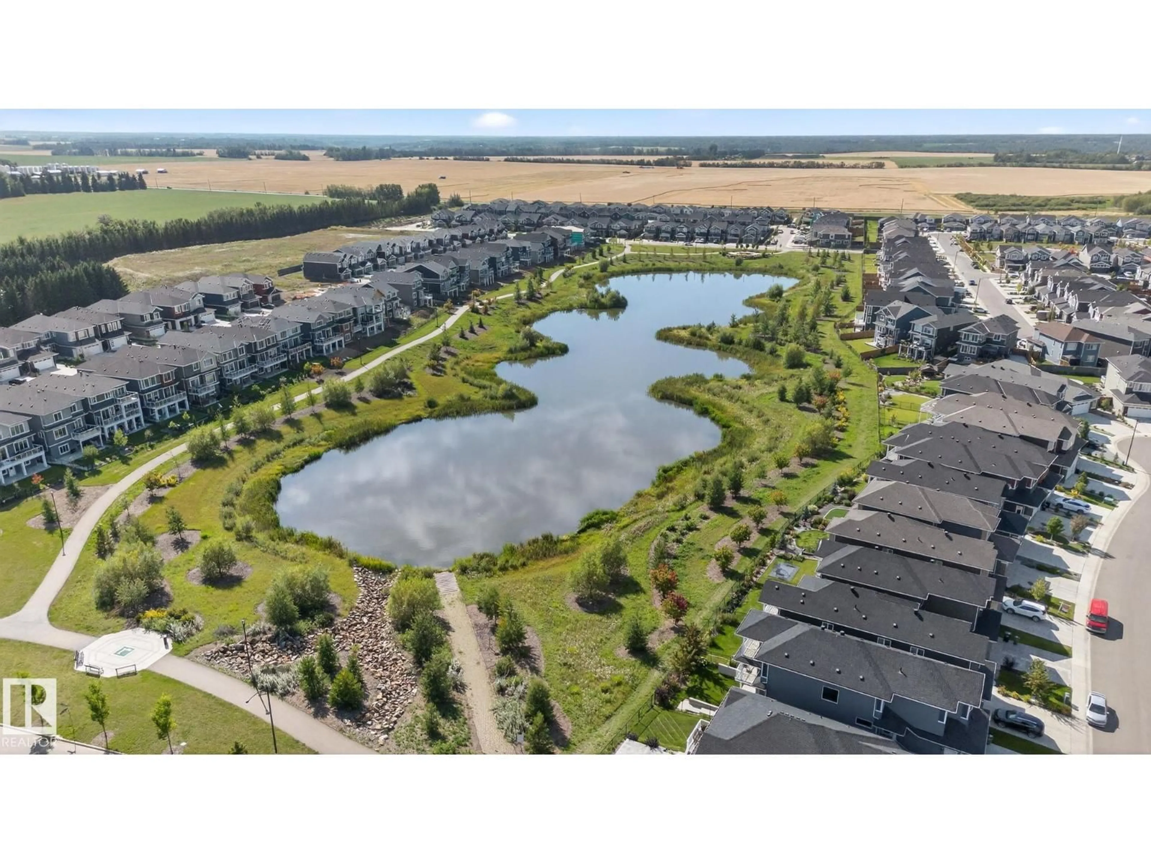 A pic from outside/outdoor area/front of a property/back of a property/a pic from drone, water/lake/river/ocean view for 583 GLENRIDDING RAVINE DR, Edmonton Alberta T6W4N9