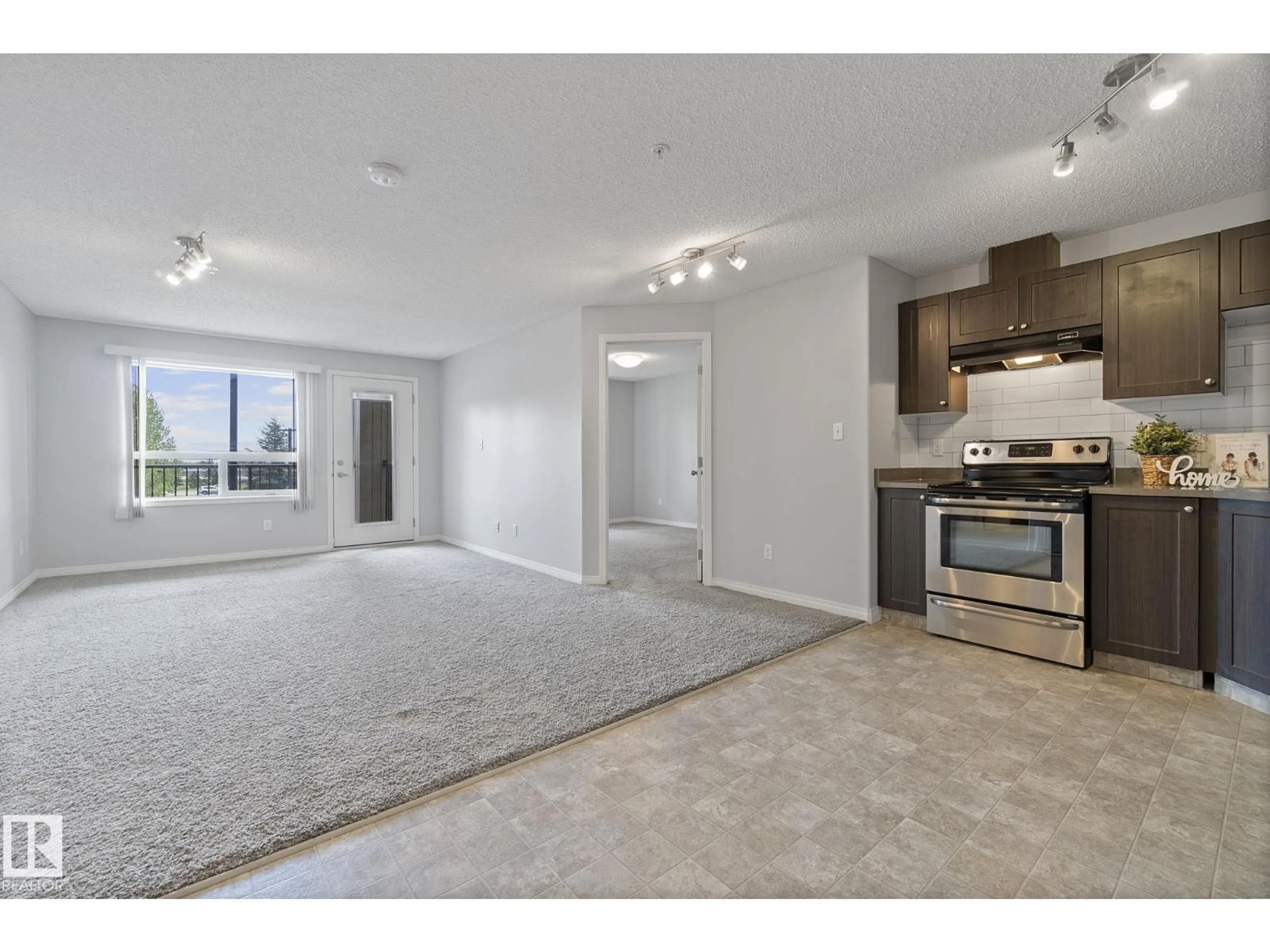 Open concept kitchen, unknown for #214 - 1520 HAMMOND GATE GA, Edmonton Alberta T6M0J4