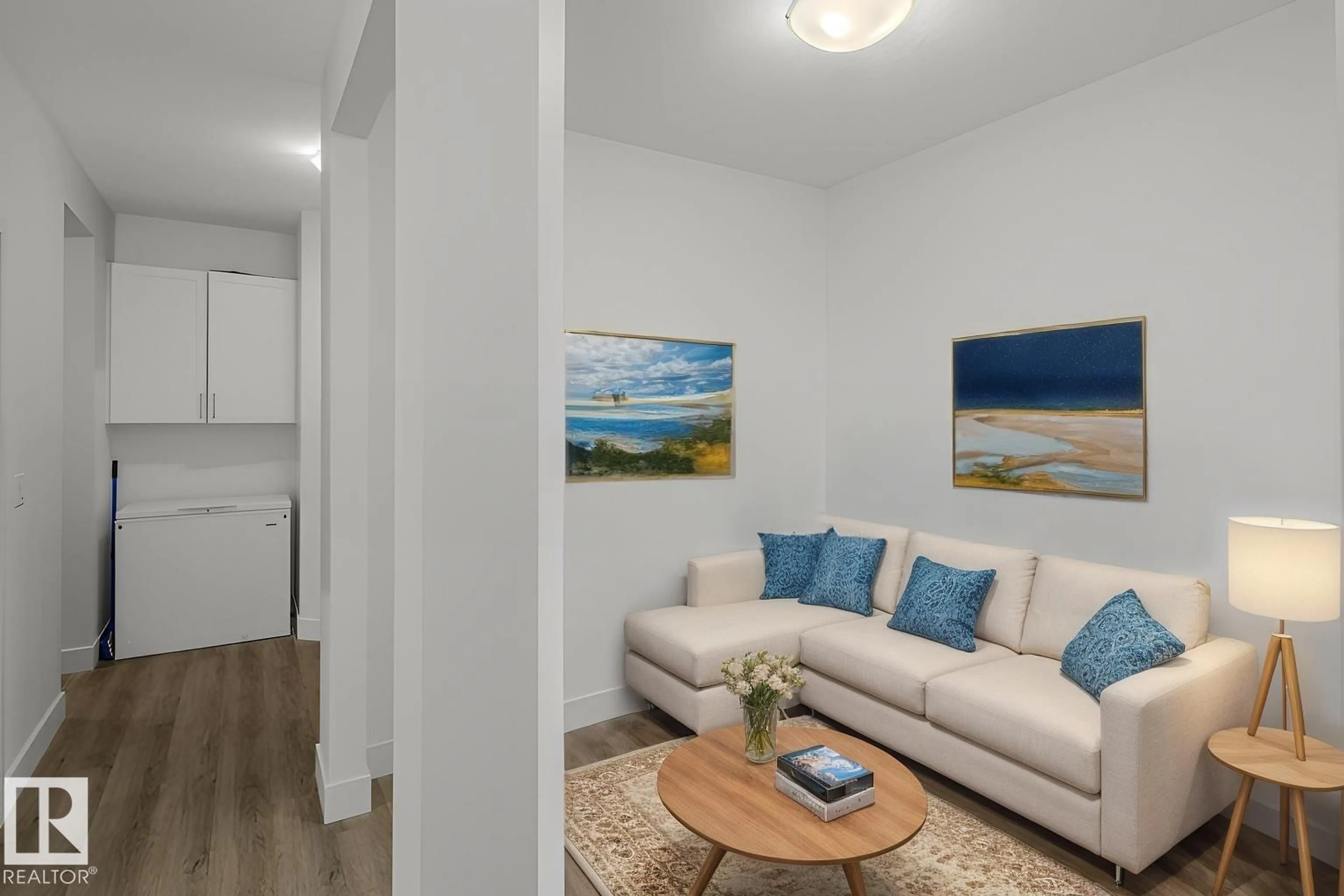 Living room with furniture, unknown for SW - 15940 19 AV, Edmonton Alberta T6W4X6