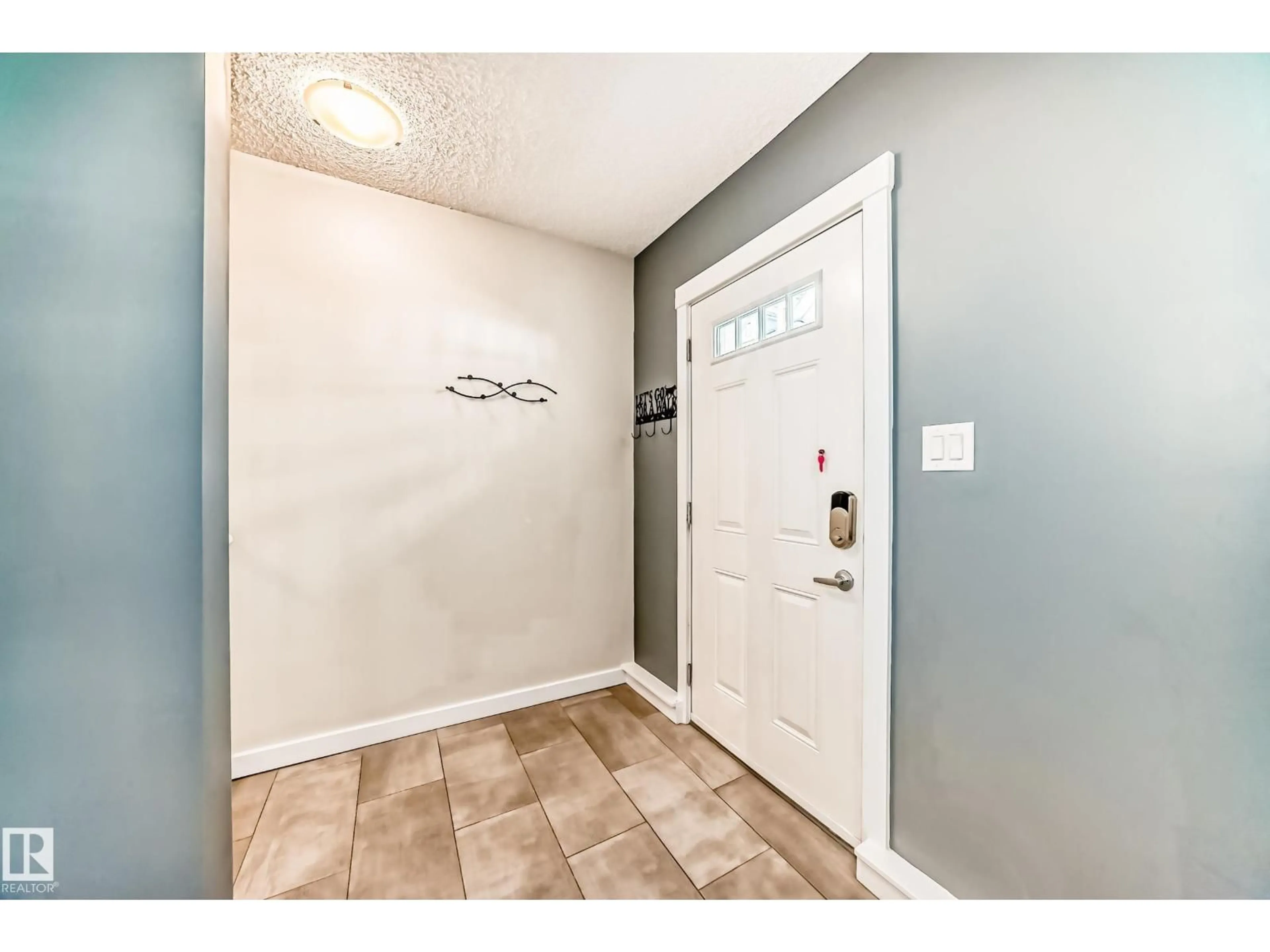 Indoor entryway for 903 - 94 CRYSTALLINA NERA WY, Edmonton Alberta T5Z0N6
