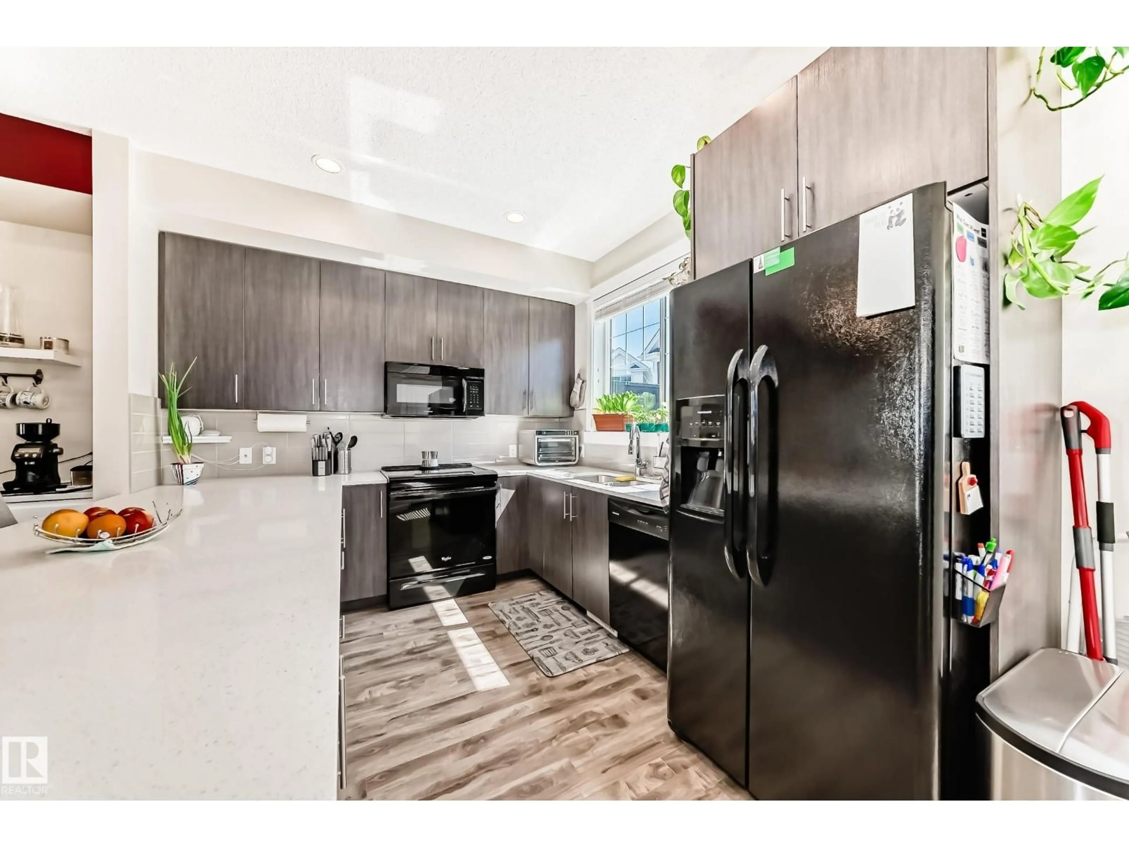 Open concept kitchen, unknown for 903 - 94 CRYSTALLINA NERA WY, Edmonton Alberta T5Z0N6