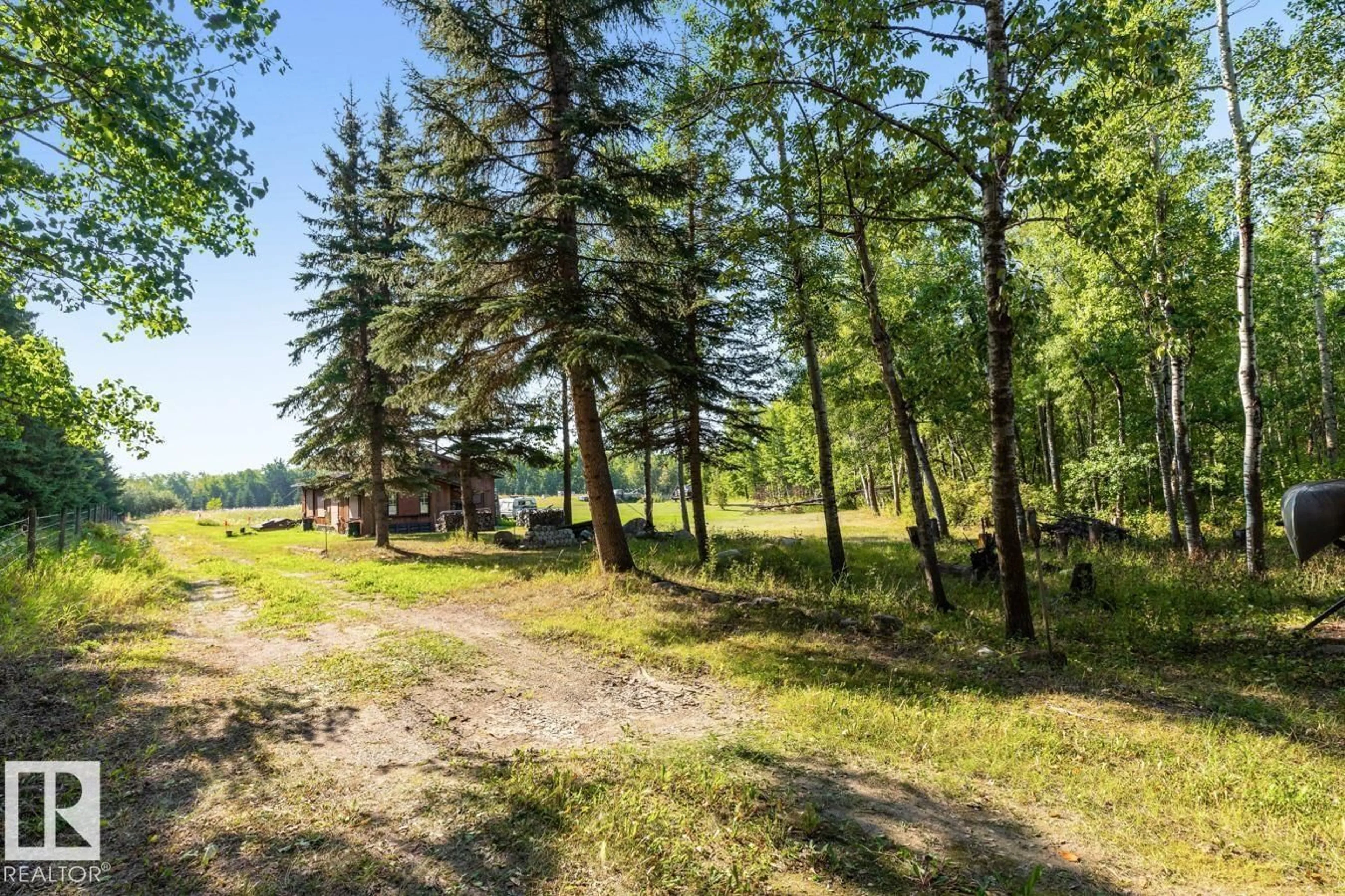 A pic from outside/outdoor area/front of a property/back of a property/a pic from drone, forest/trees view for 85 52110 RGE ROAD 214, Rural Strathcona County Alberta T8E1A4