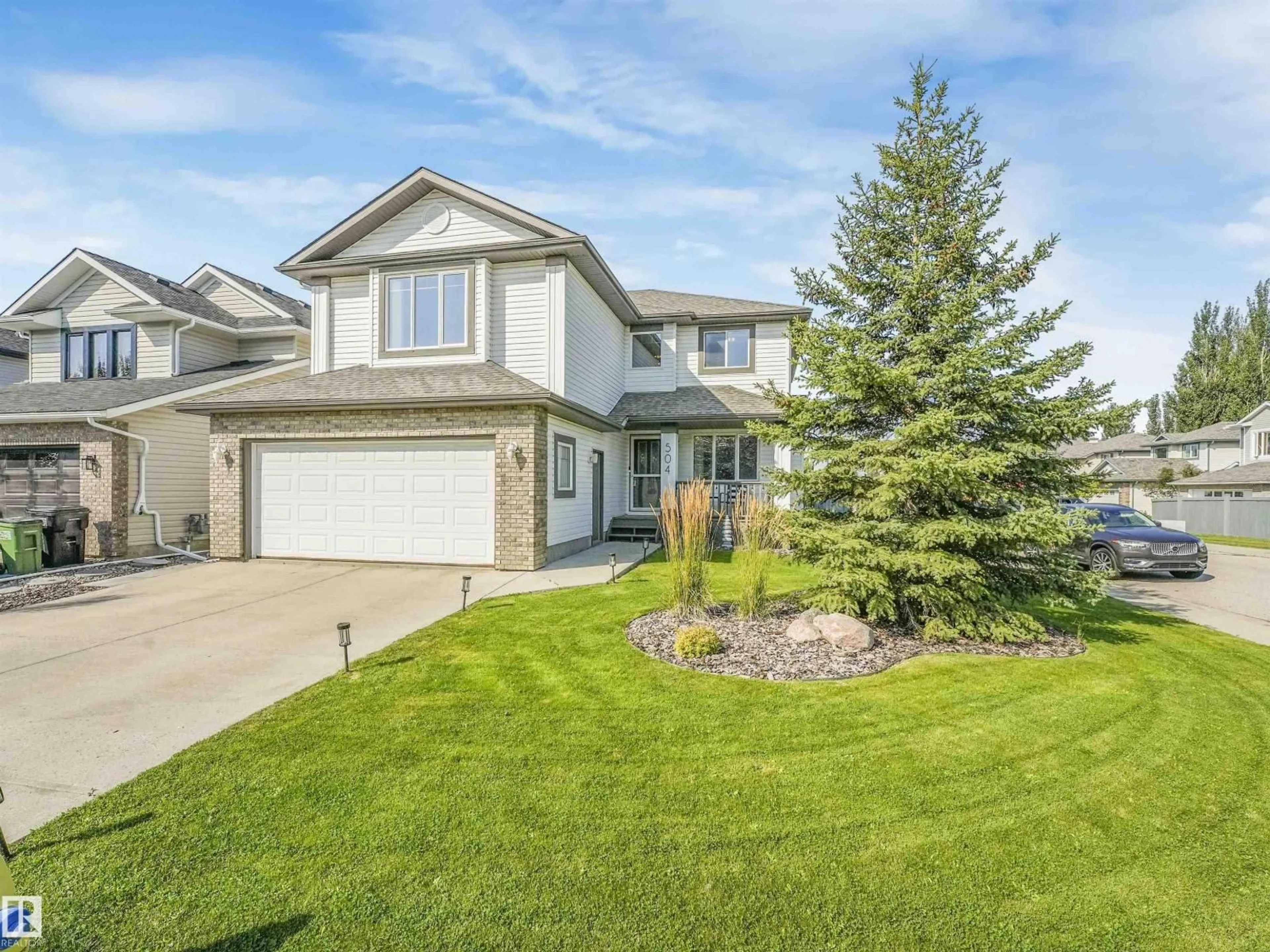 Home with vinyl exterior material, street for 504 BYRNE CR, Edmonton Alberta T6W1E2