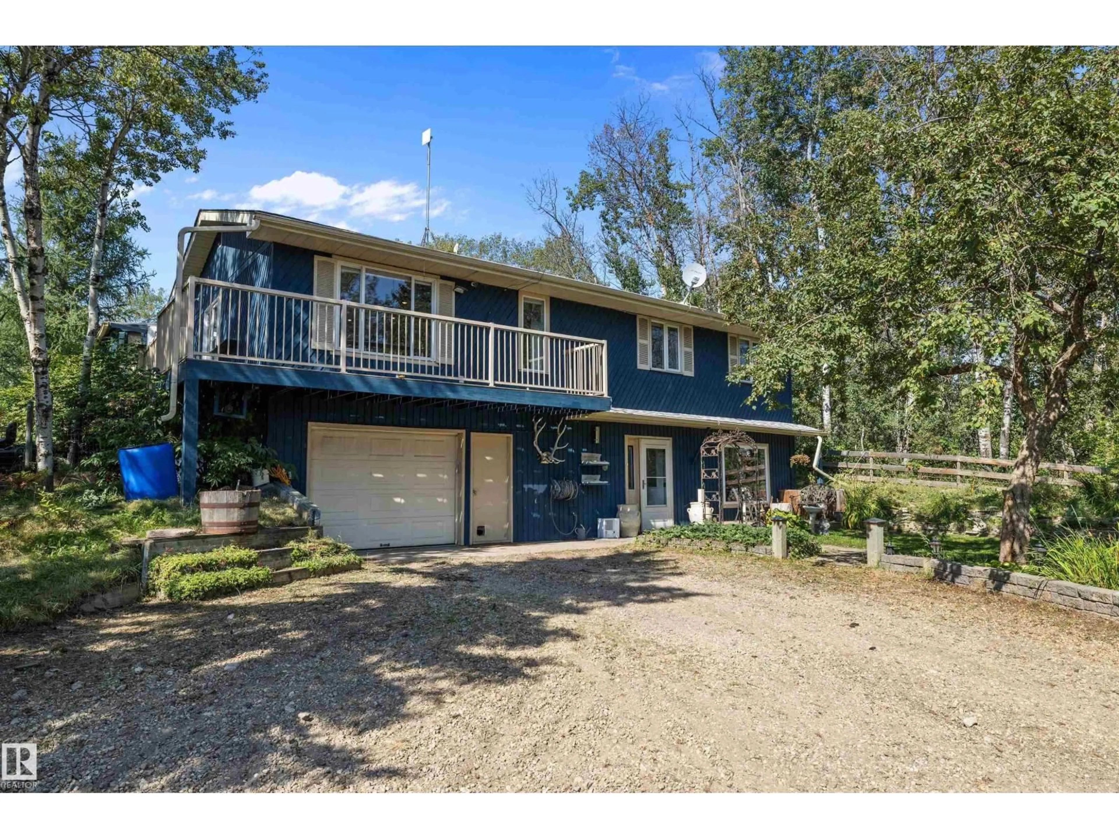 A pic from outside/outdoor area/front of a property/back of a property/a pic from drone, water/lake/river/ocean view for 52010 - 169 RGE ROAD 233, Rural Strathcona County Alberta T8B1C4