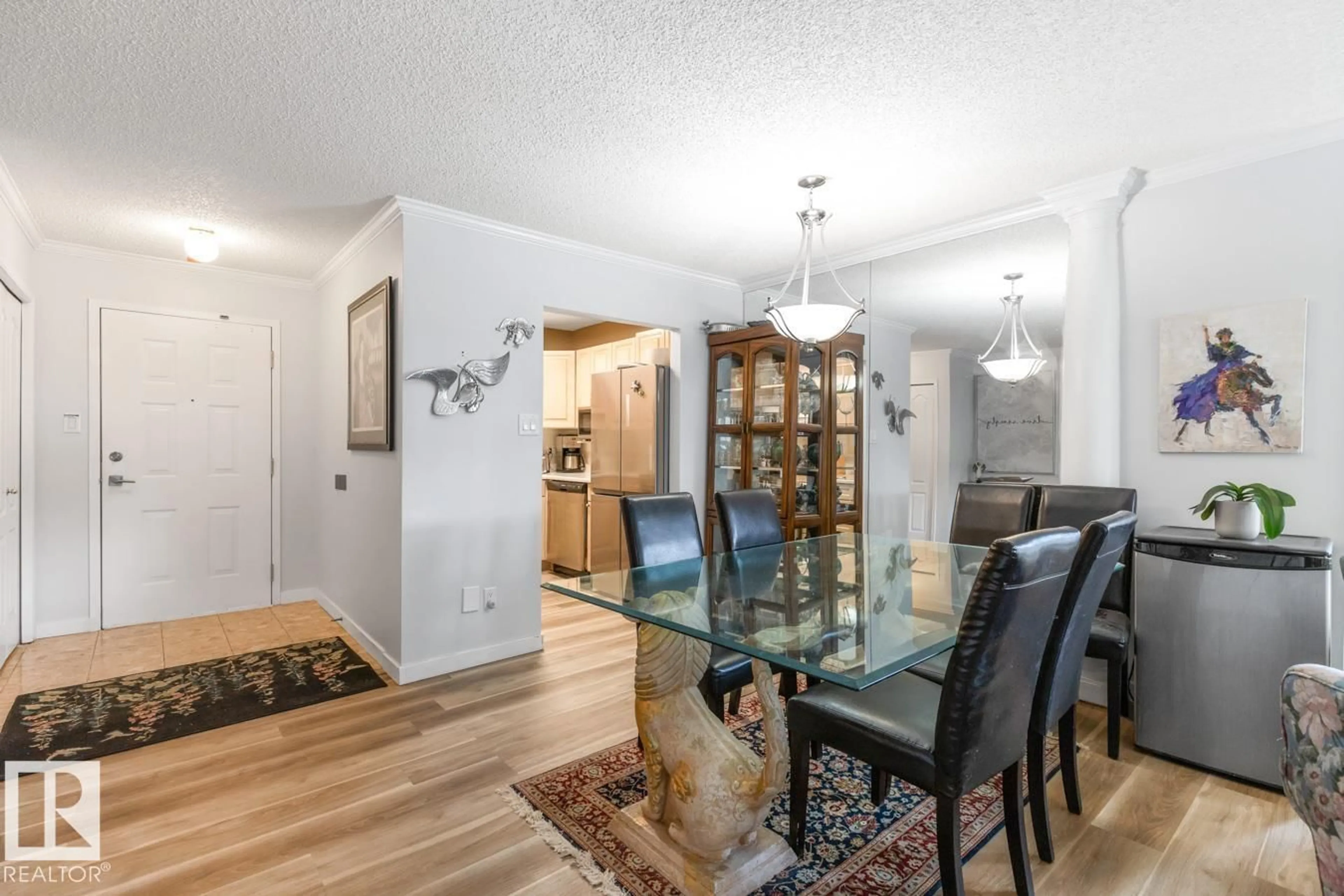 Dining room, wood/laminate floor for #103 - 17151 94A AV, Edmonton Alberta T5T5Z9