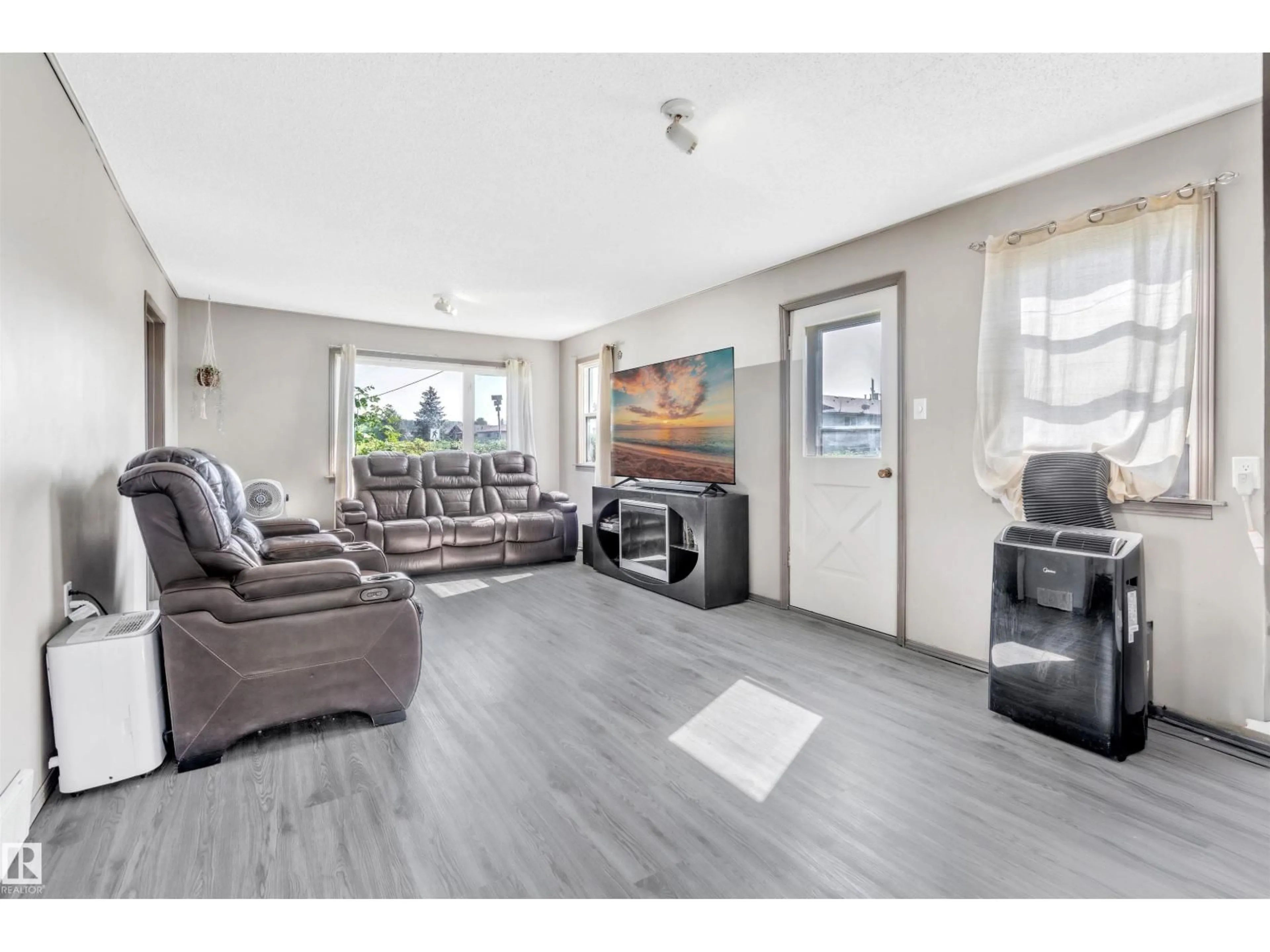 Living room with furniture, unknown for 4702 50 AV, Cold Lake Alberta T9M1Y9