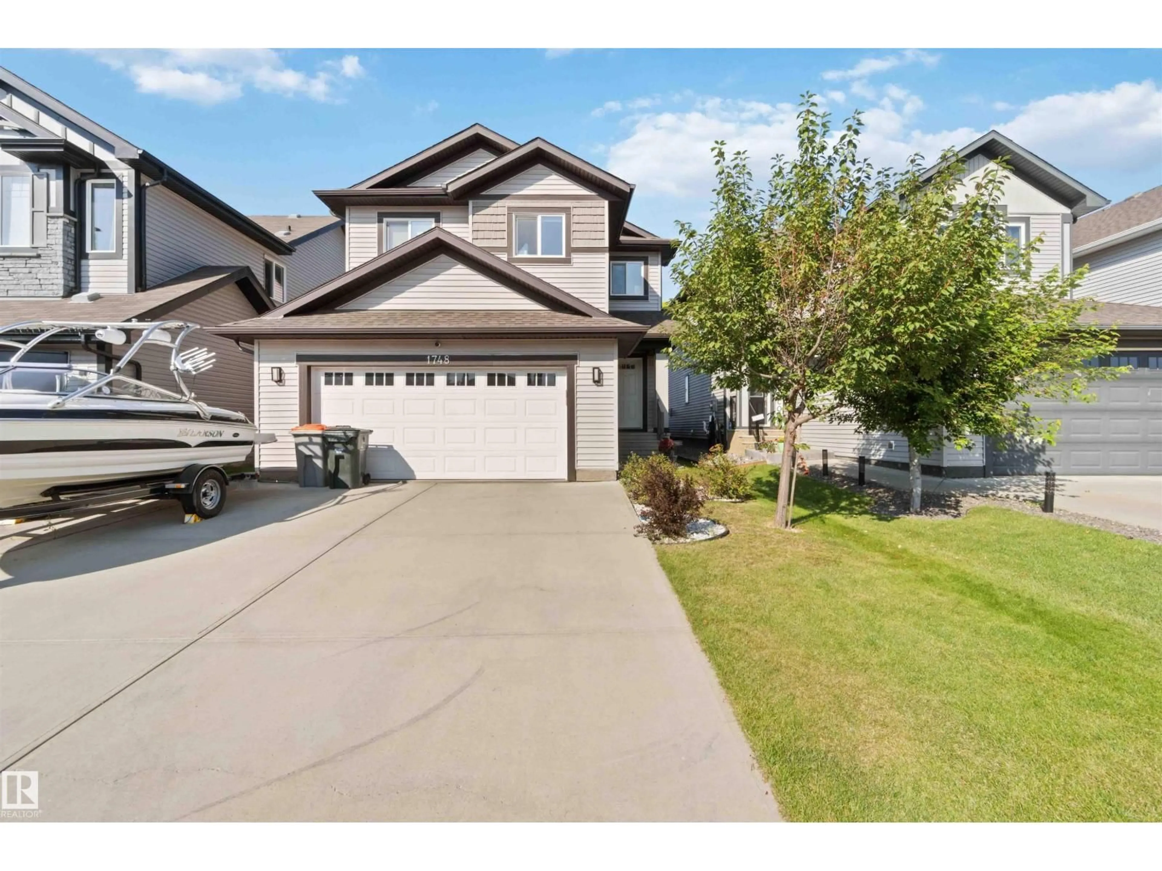 A pic from outside/outdoor area/front of a property/back of a property/a pic from drone, street for 1748 WESTERRA LO, Stony Plain Alberta T7Z0K9