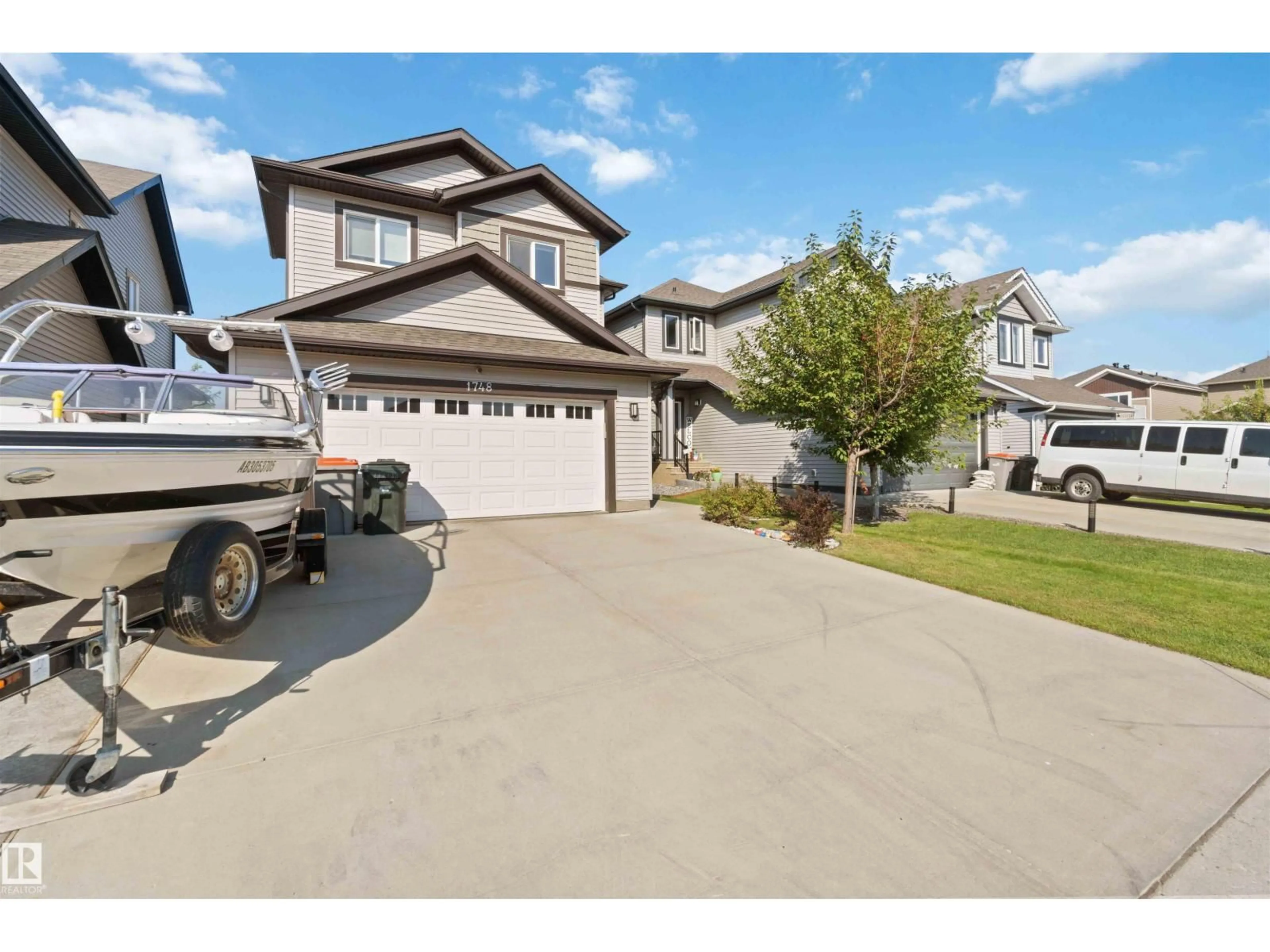 A pic from outside/outdoor area/front of a property/back of a property/a pic from drone, street for 1748 WESTERRA LO, Stony Plain Alberta T7Z0K9