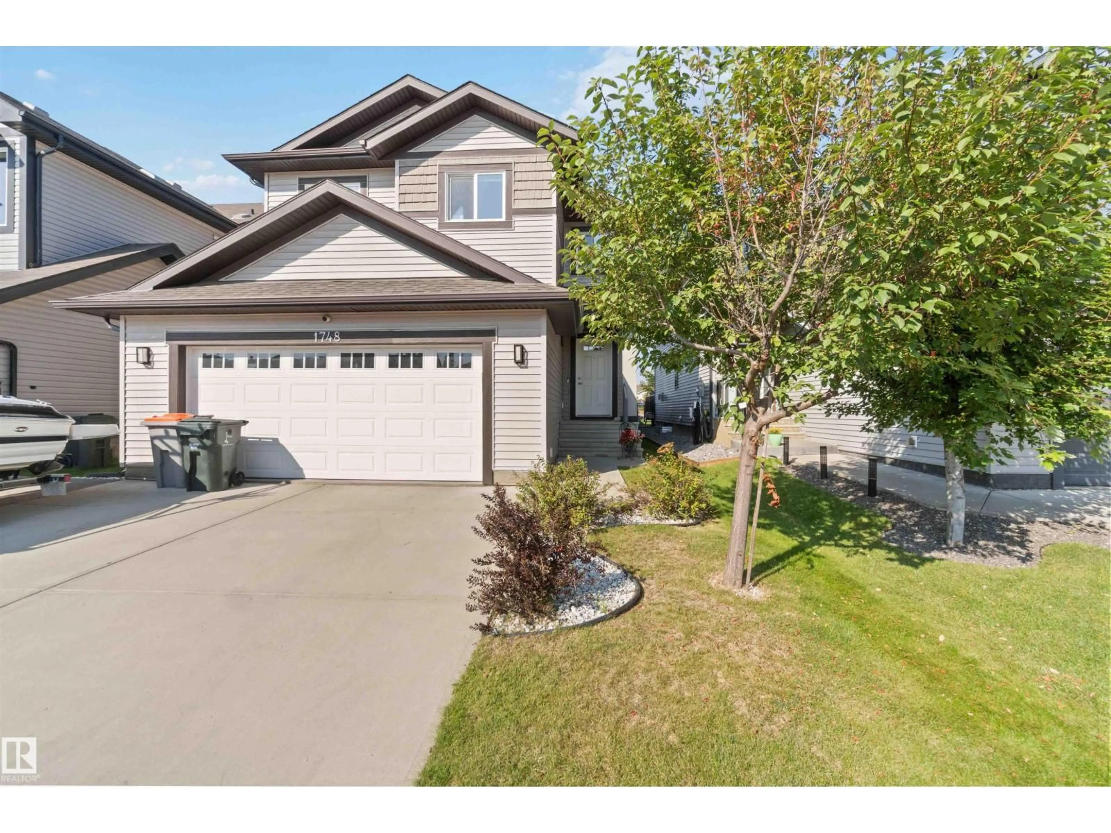 A pic from outside/outdoor area/front of a property/back of a property/a pic from drone, street for 1748 WESTERRA LO, Stony Plain Alberta T7Z0K9