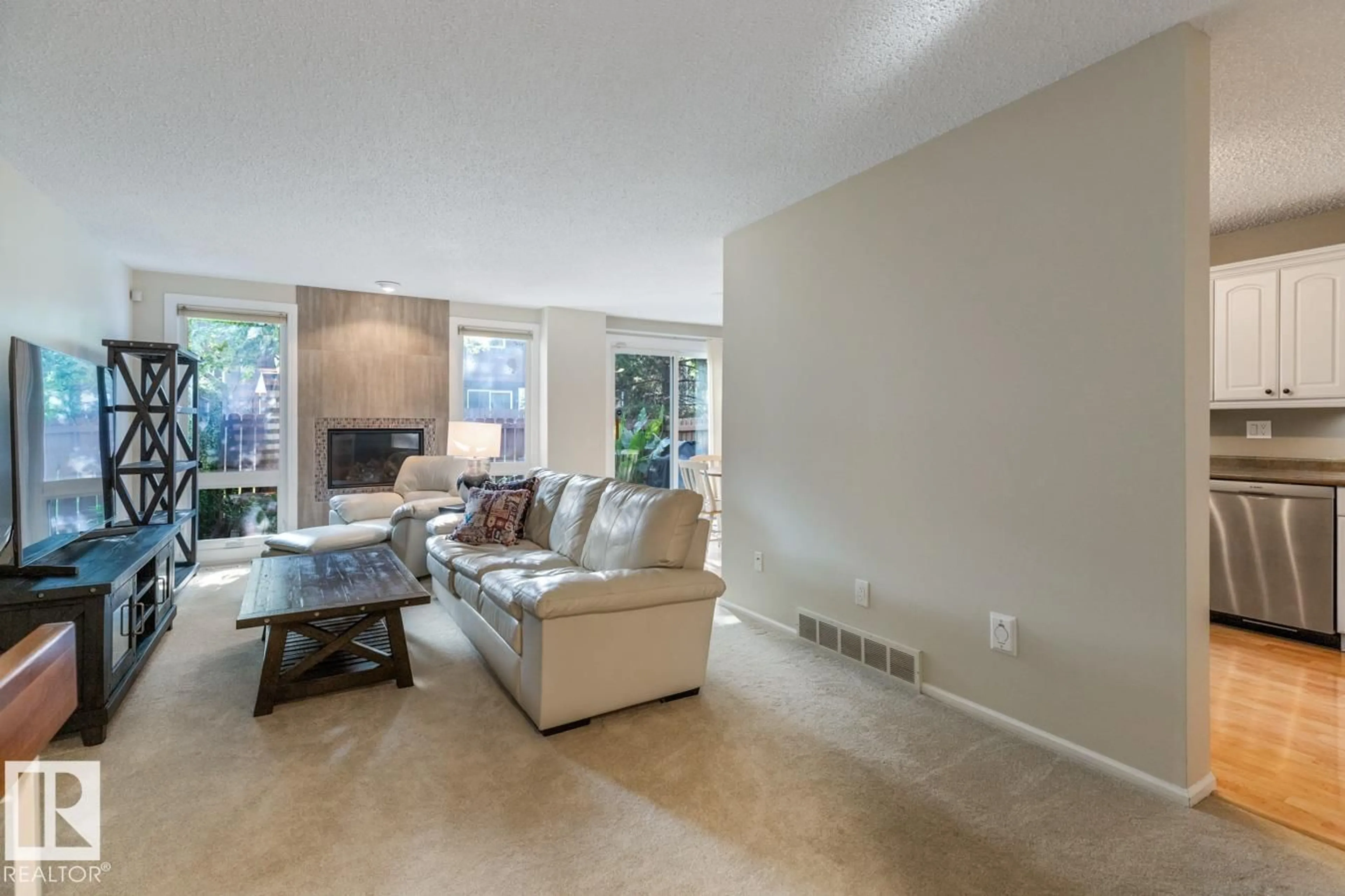 Living room with furniture, ceramic/tile floor for 90 HEARTHSTONE NW, Edmonton Alberta T6H5E5