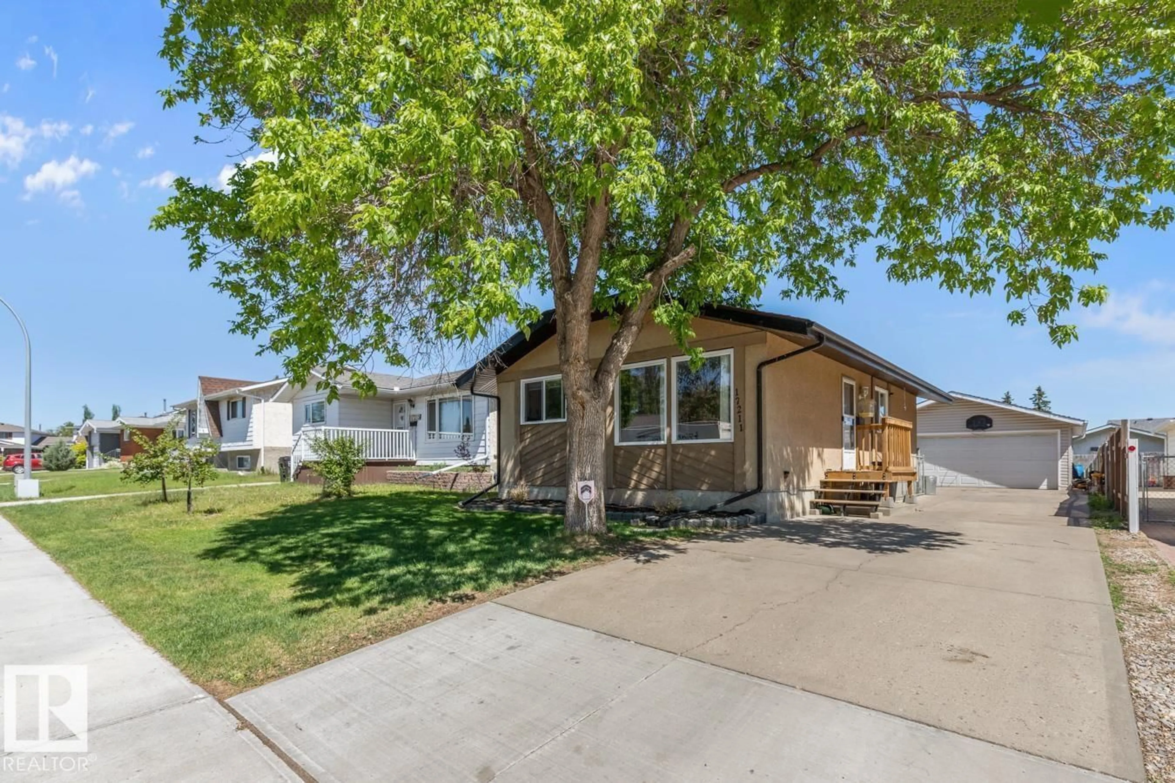 Home with vinyl exterior material, street for NW - 17211 102 ST, Edmonton Alberta T5X3X5