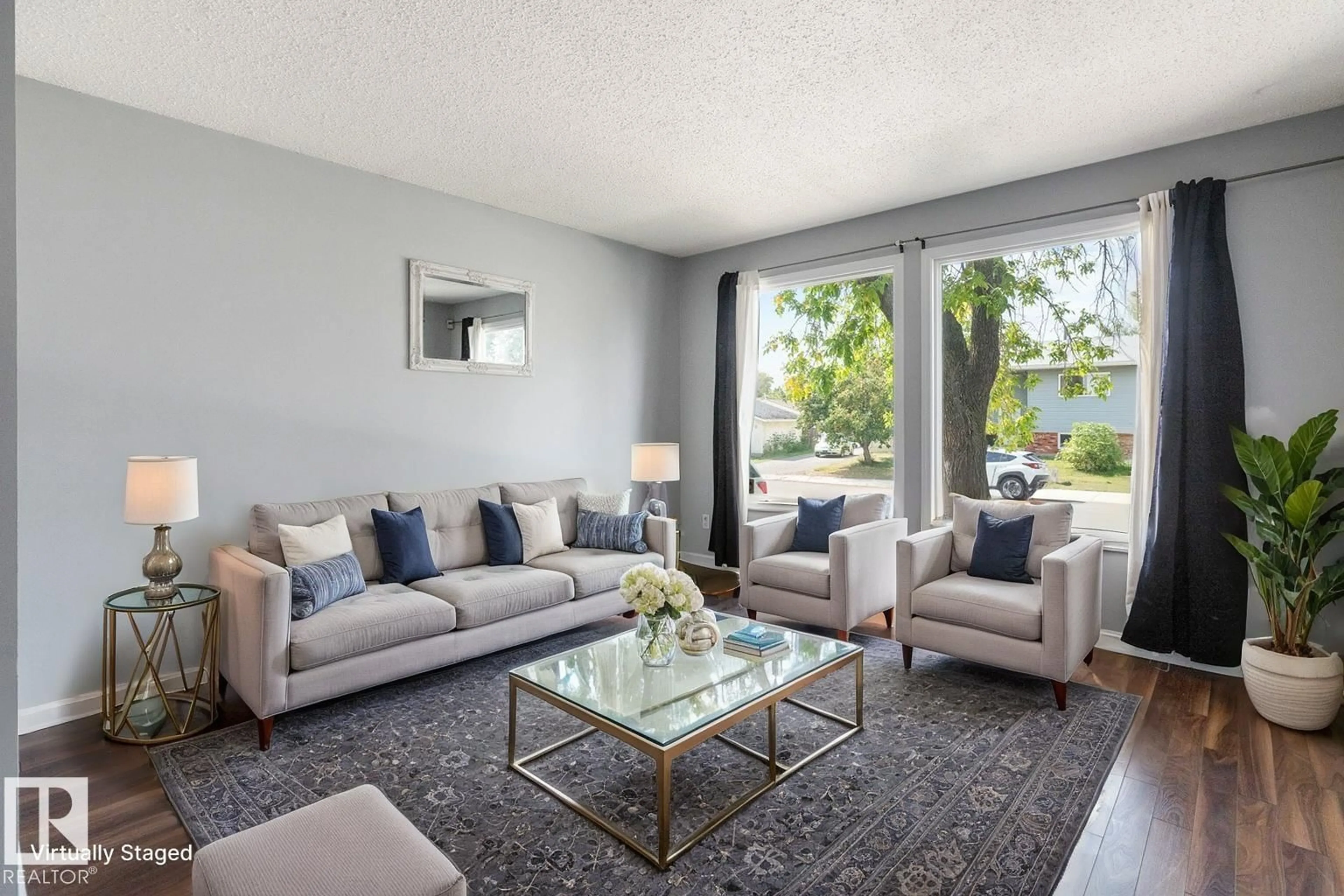 Living room with furniture, unknown for NW - 17211 102 ST, Edmonton Alberta T5X3X5